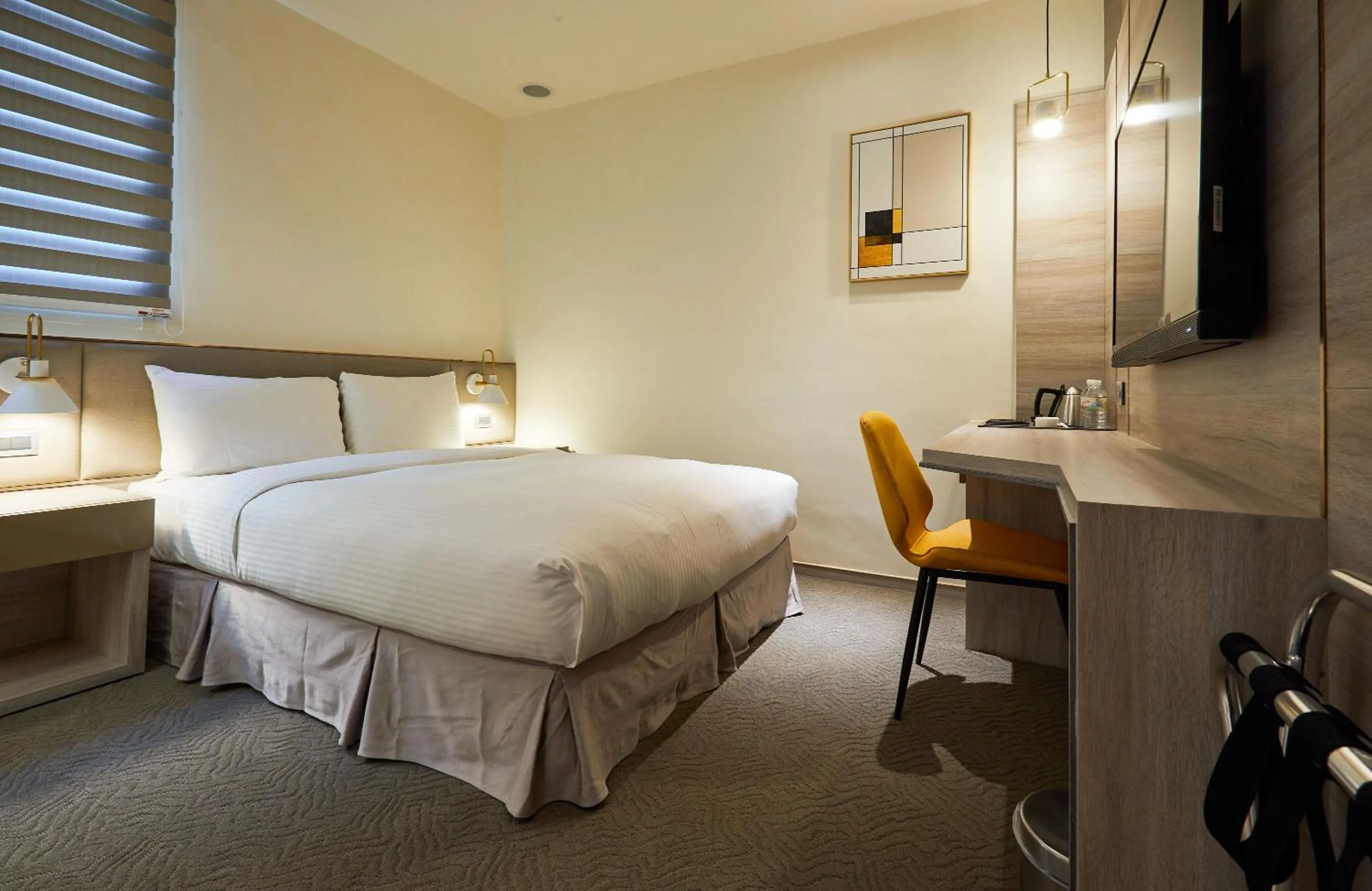 Bed in Hai Fu Hotel & Suites