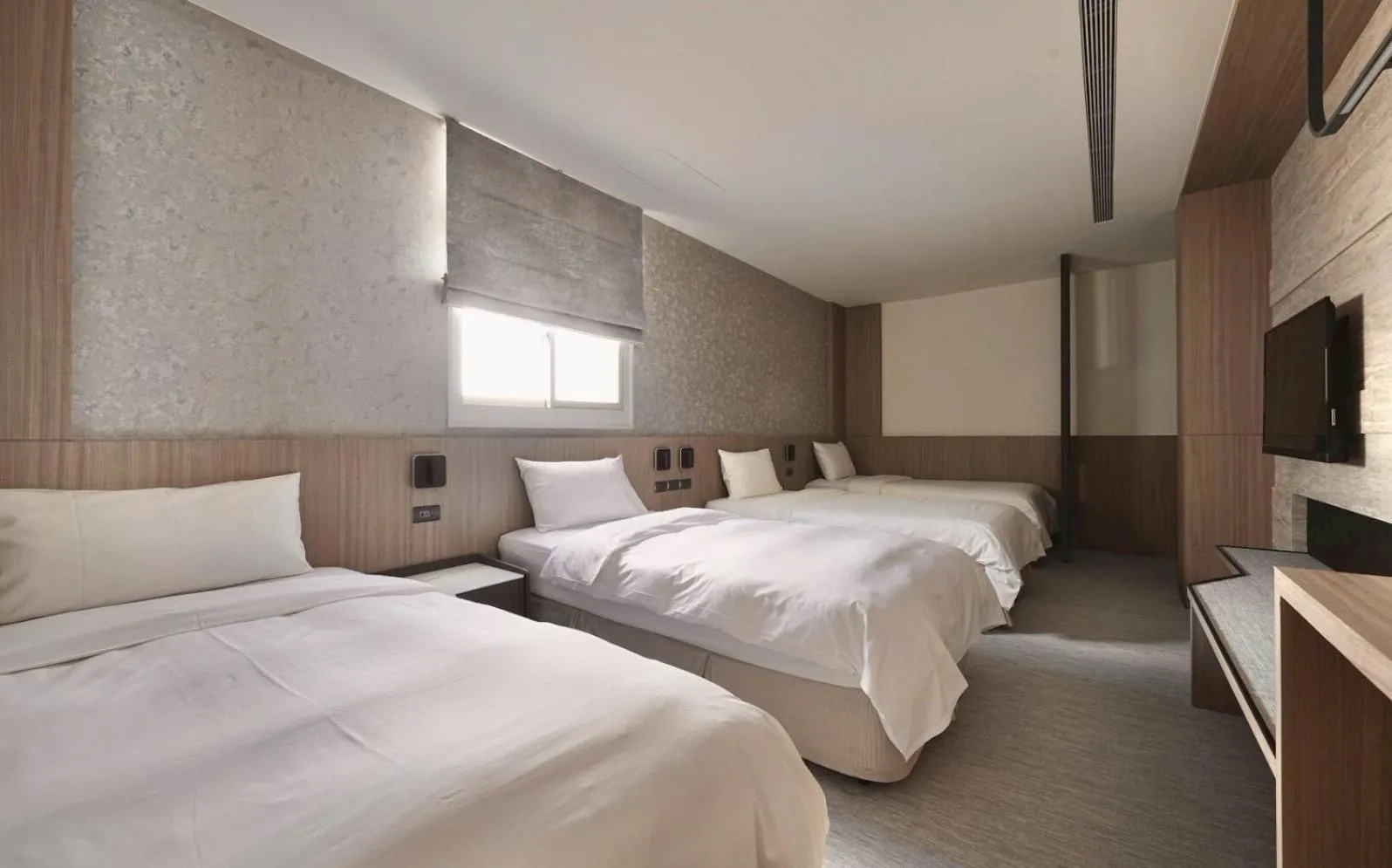 Bed in Hai Fu Hotel & Suites