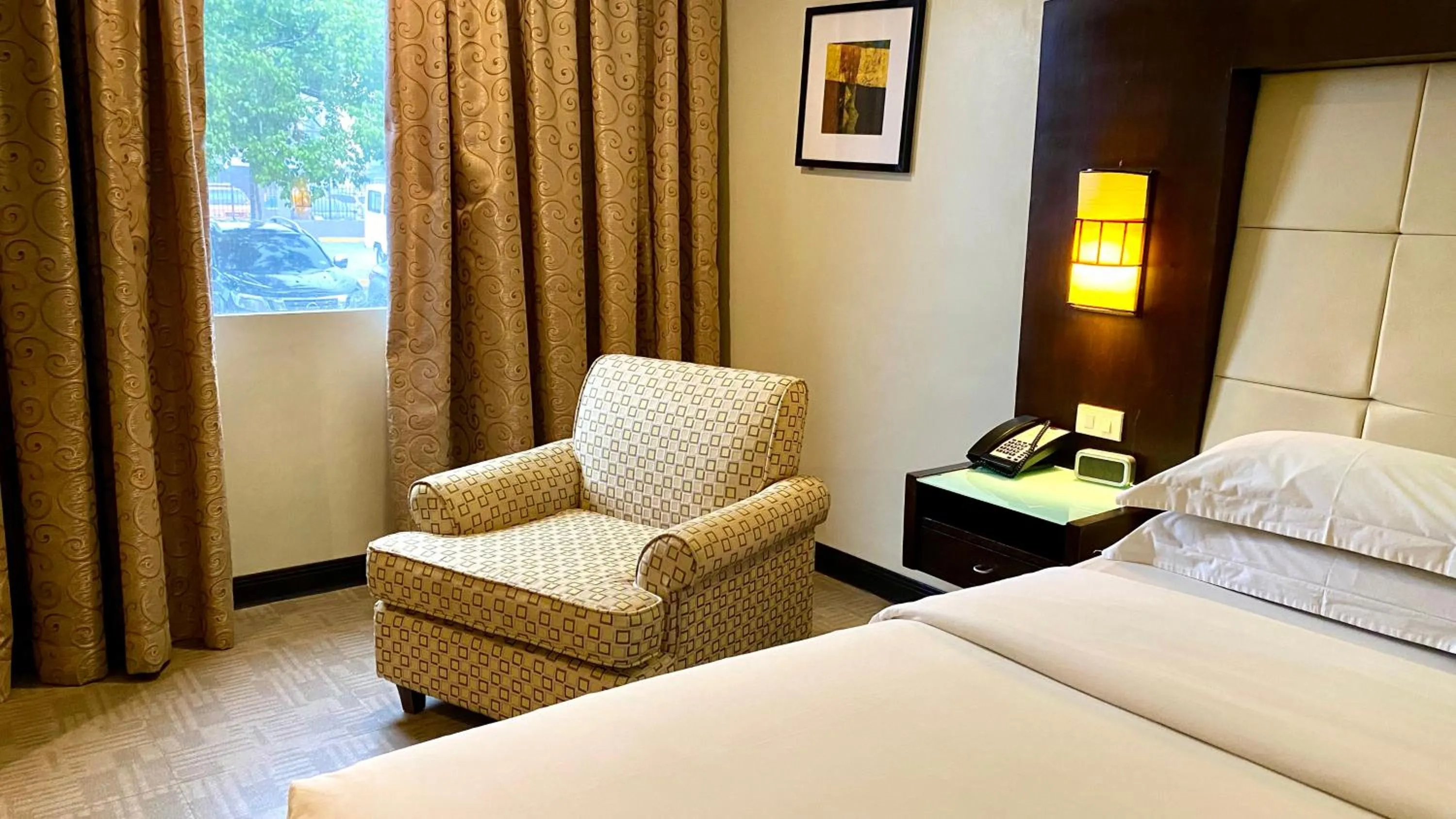 Bedroom, Bed in Circle Inn Hotel and Suites Bacolod