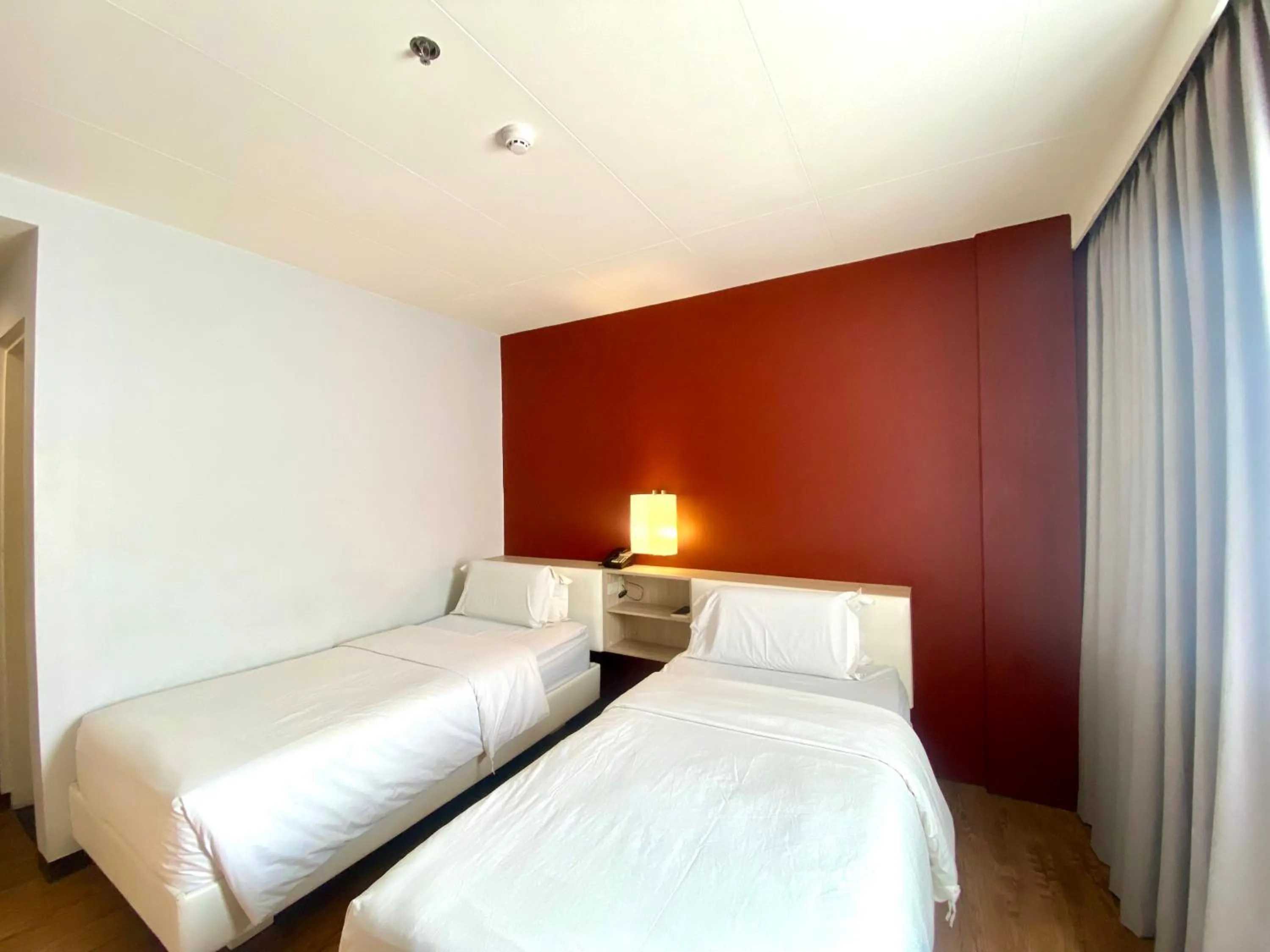 Bed in Circle Inn Hotel and Suites Bacolod