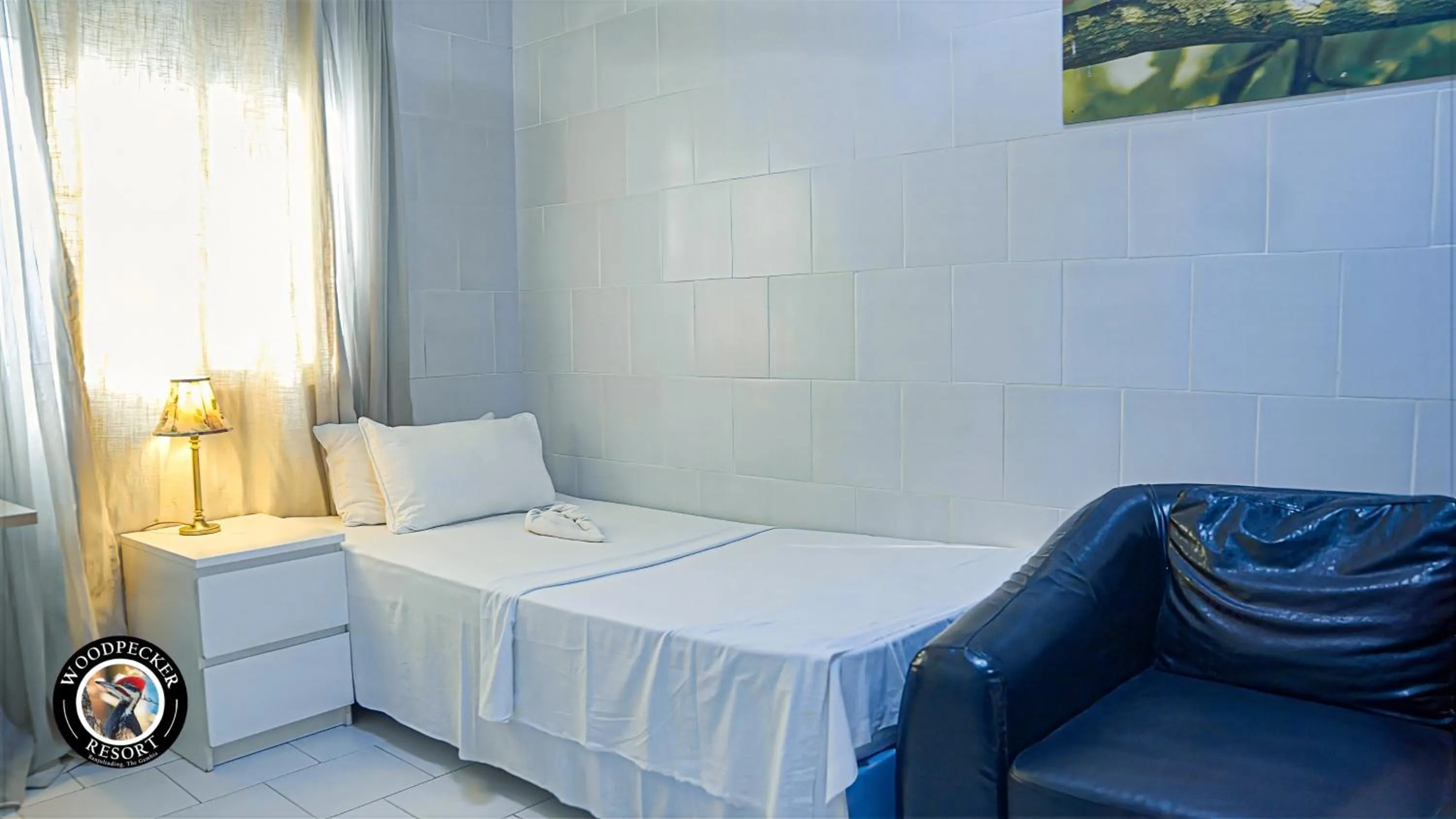 Bed in Woodpecker Resort Hotel