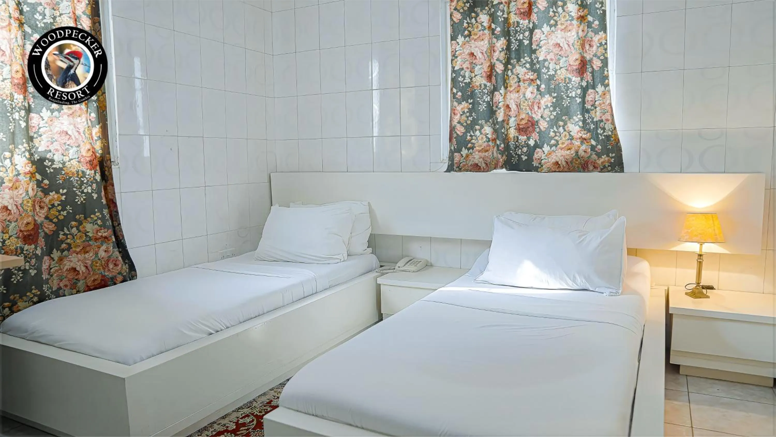 Bed in Woodpecker Resort Hotel