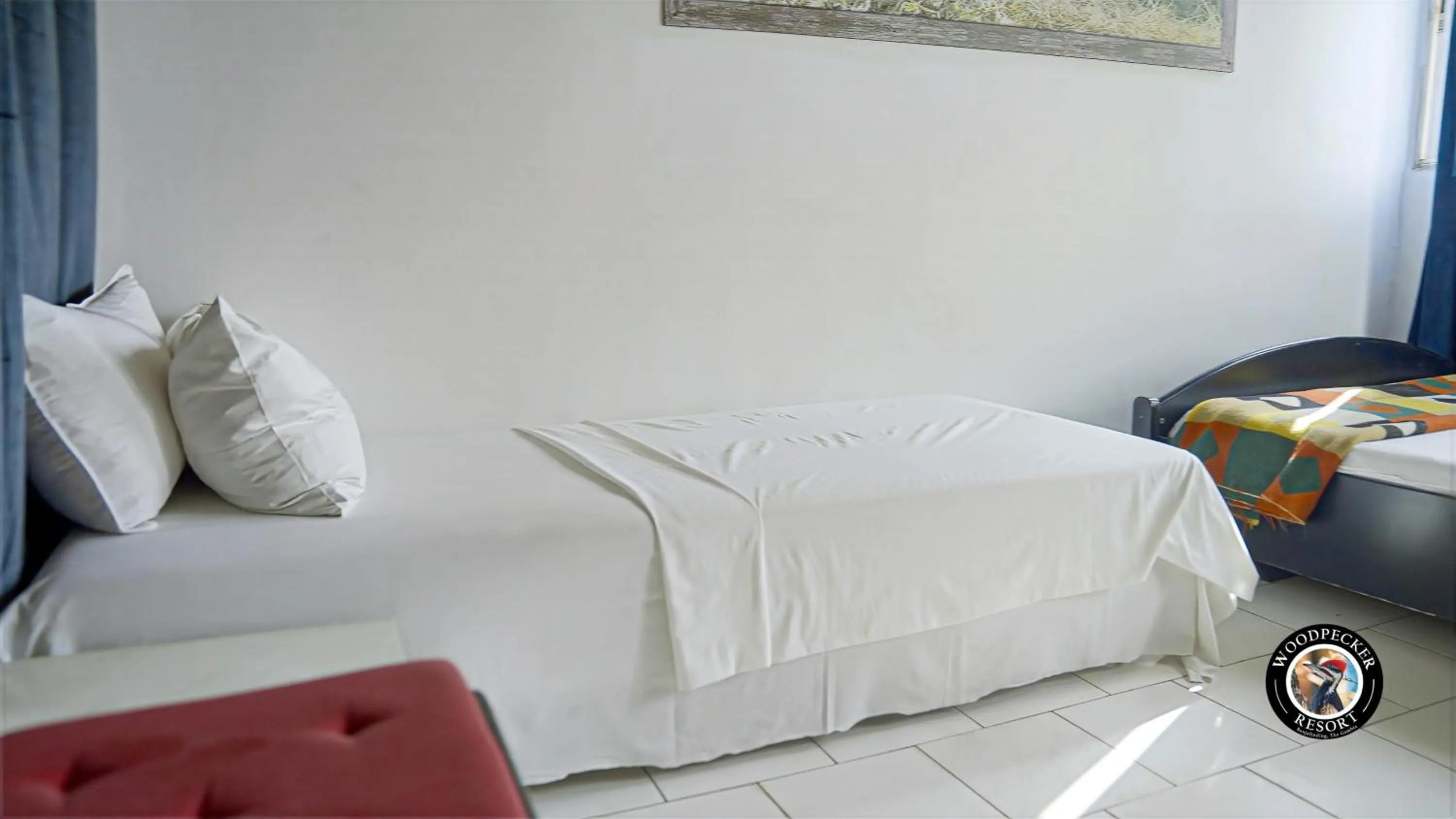 Bed in Woodpecker Resort Hotel