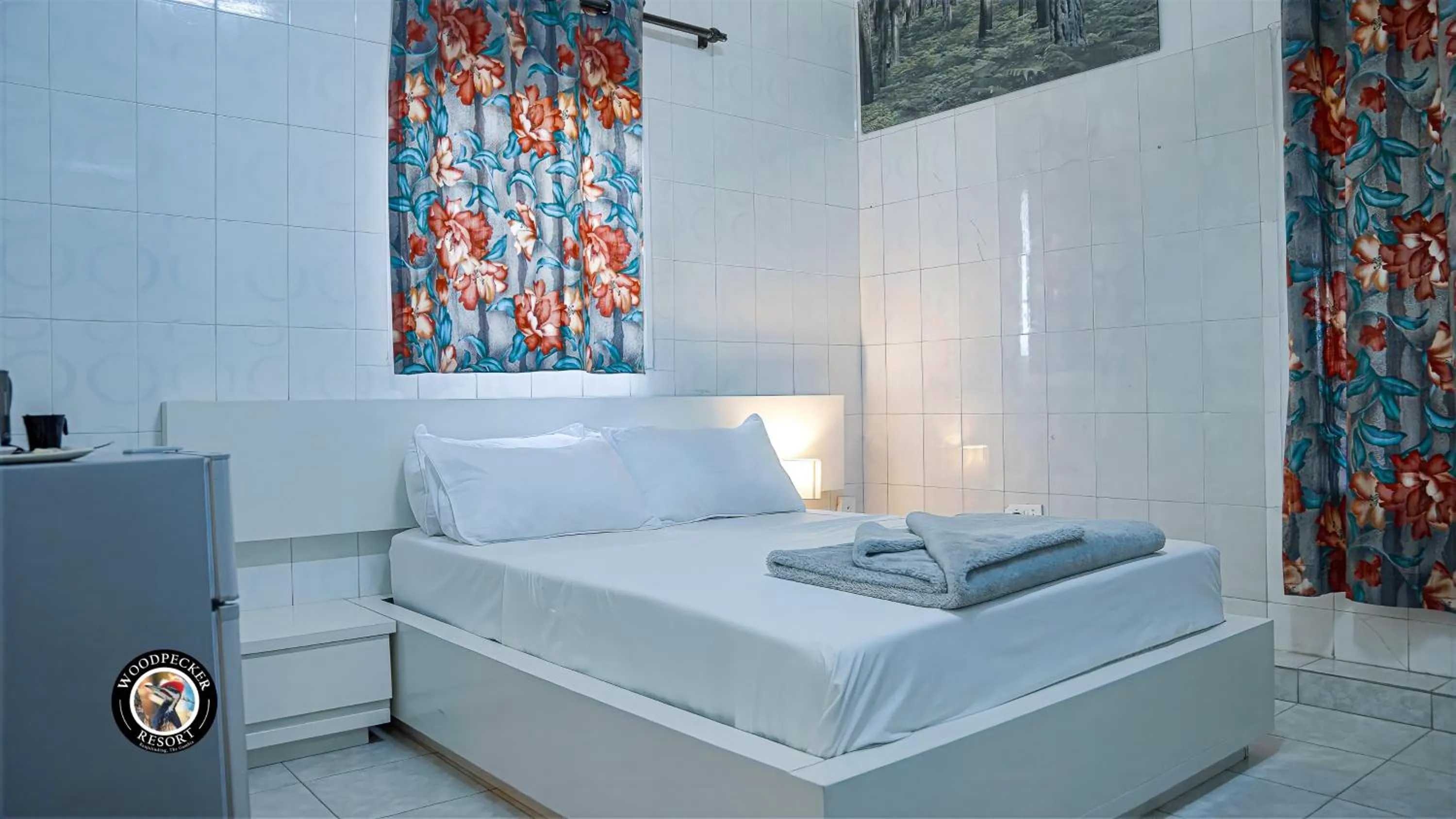 Bed in Woodpecker Resort Hotel