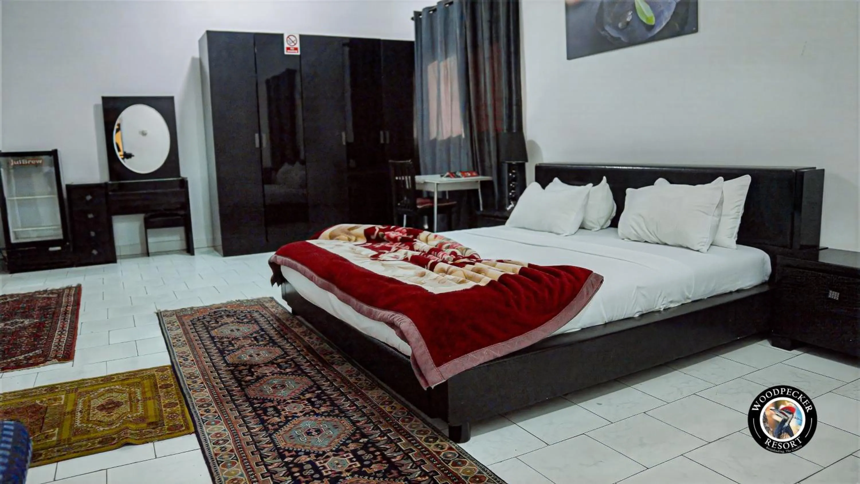 Bed in Woodpecker Resort Hotel