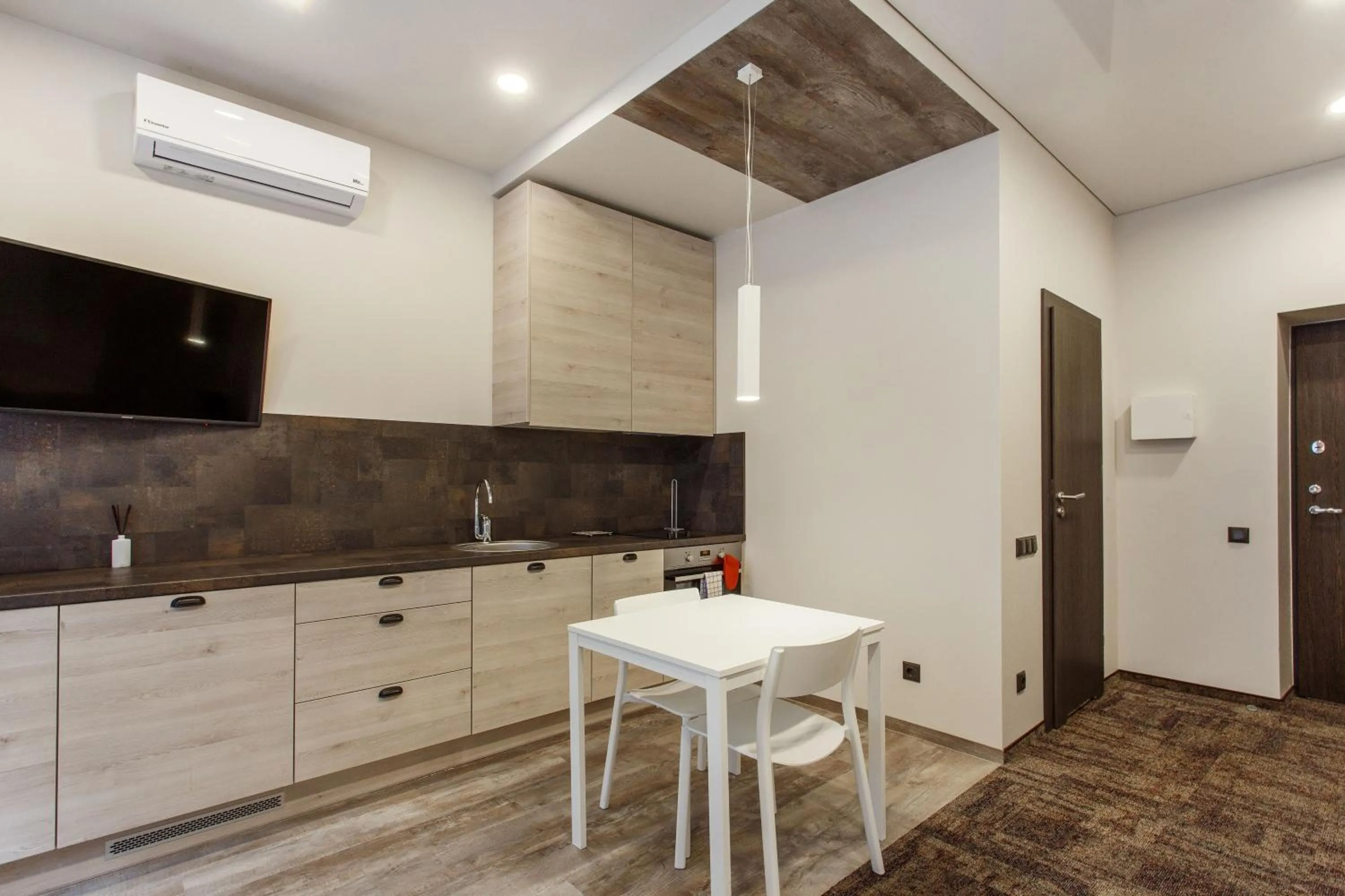 Kitchen or kitchenette in Old Town Trio Apartments