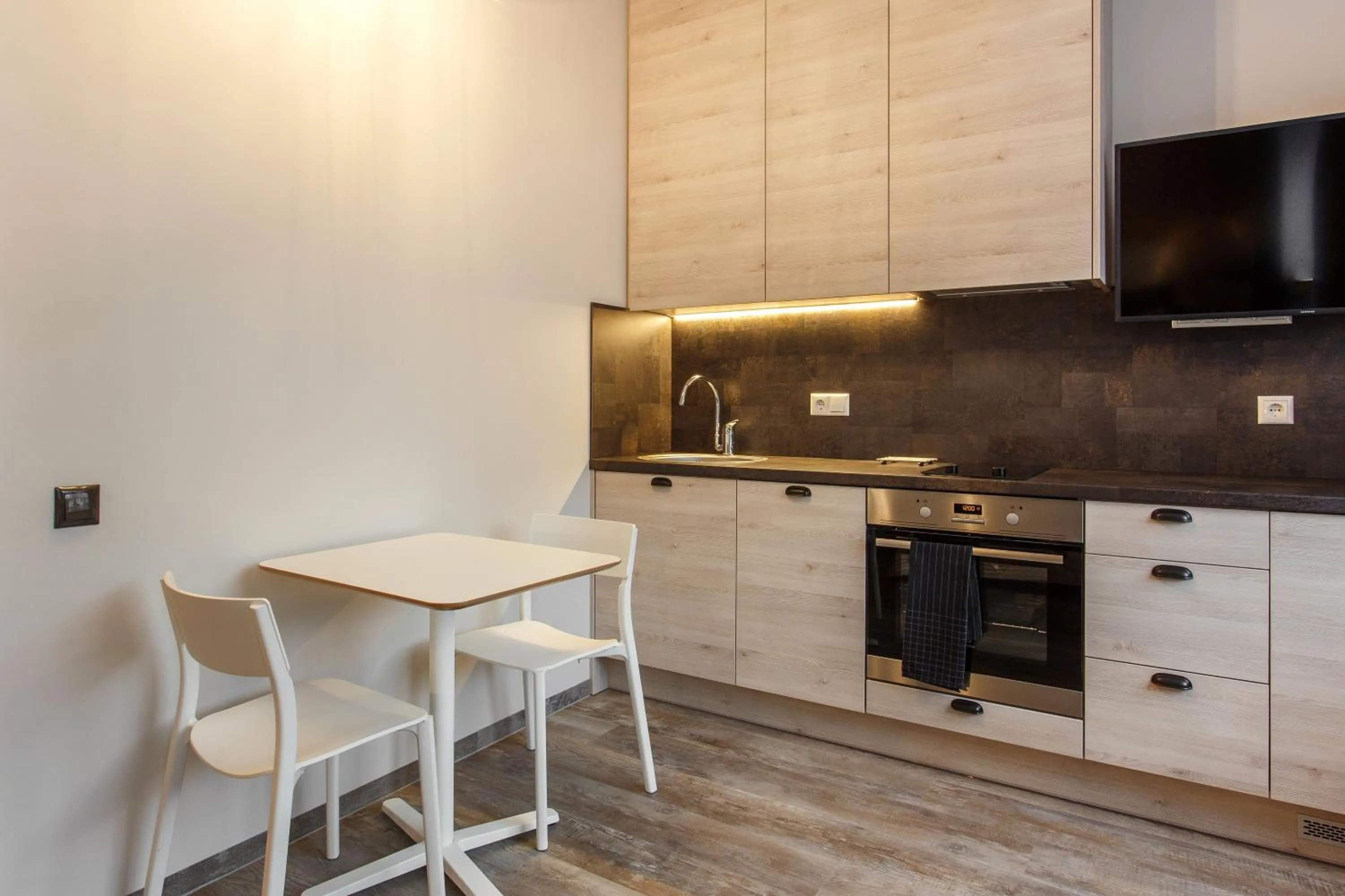 Photo of the whole room in Old Town Trio Apartments