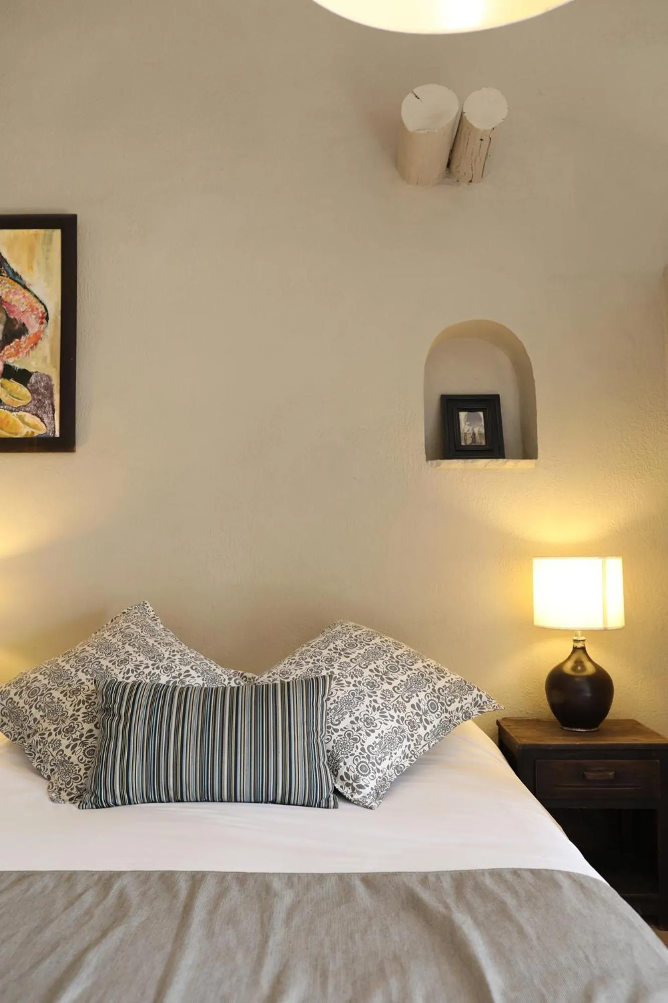 Bed in Le Petit Hôtel du Flouka