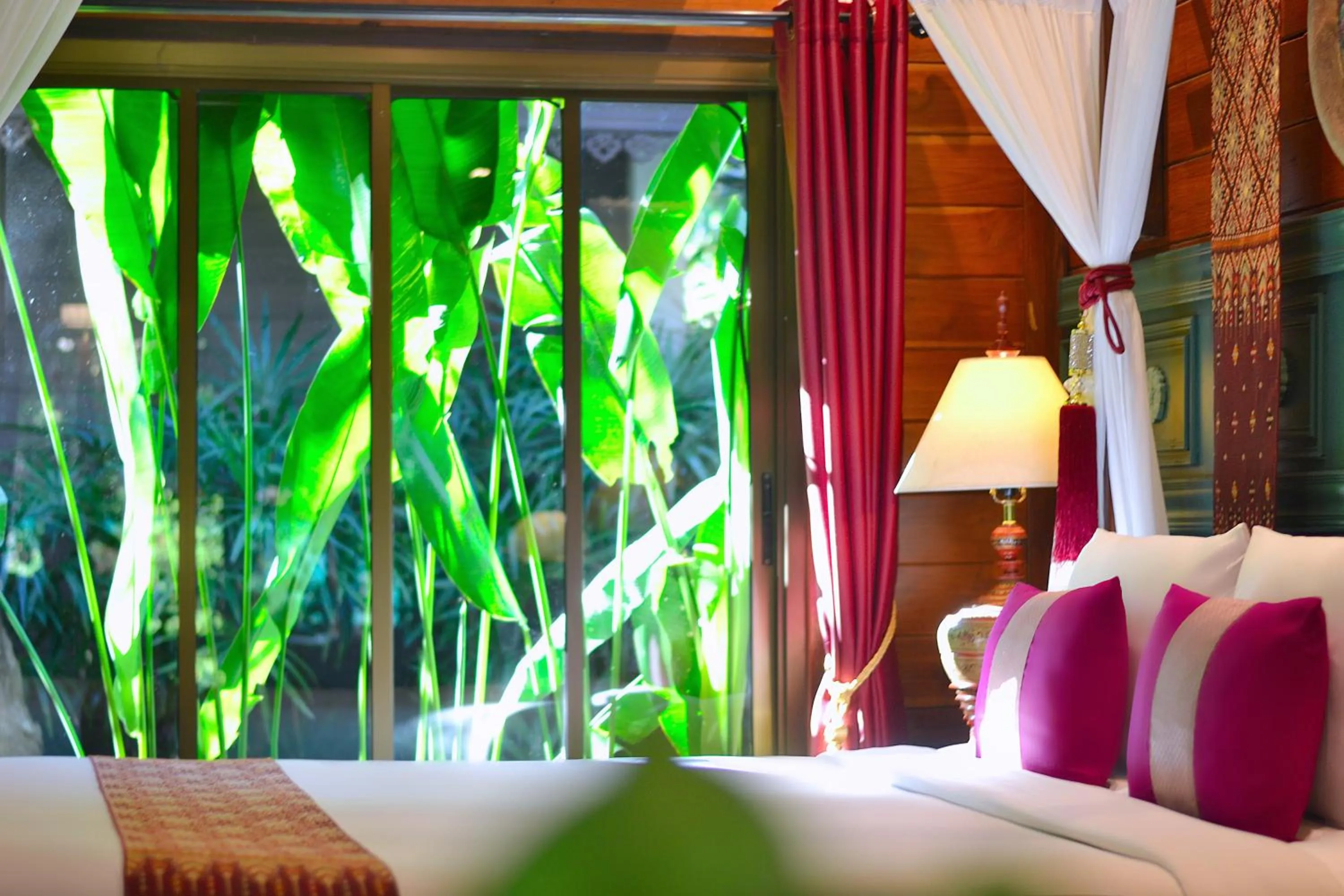 Bed in Thai Thai Sukhothai Resort