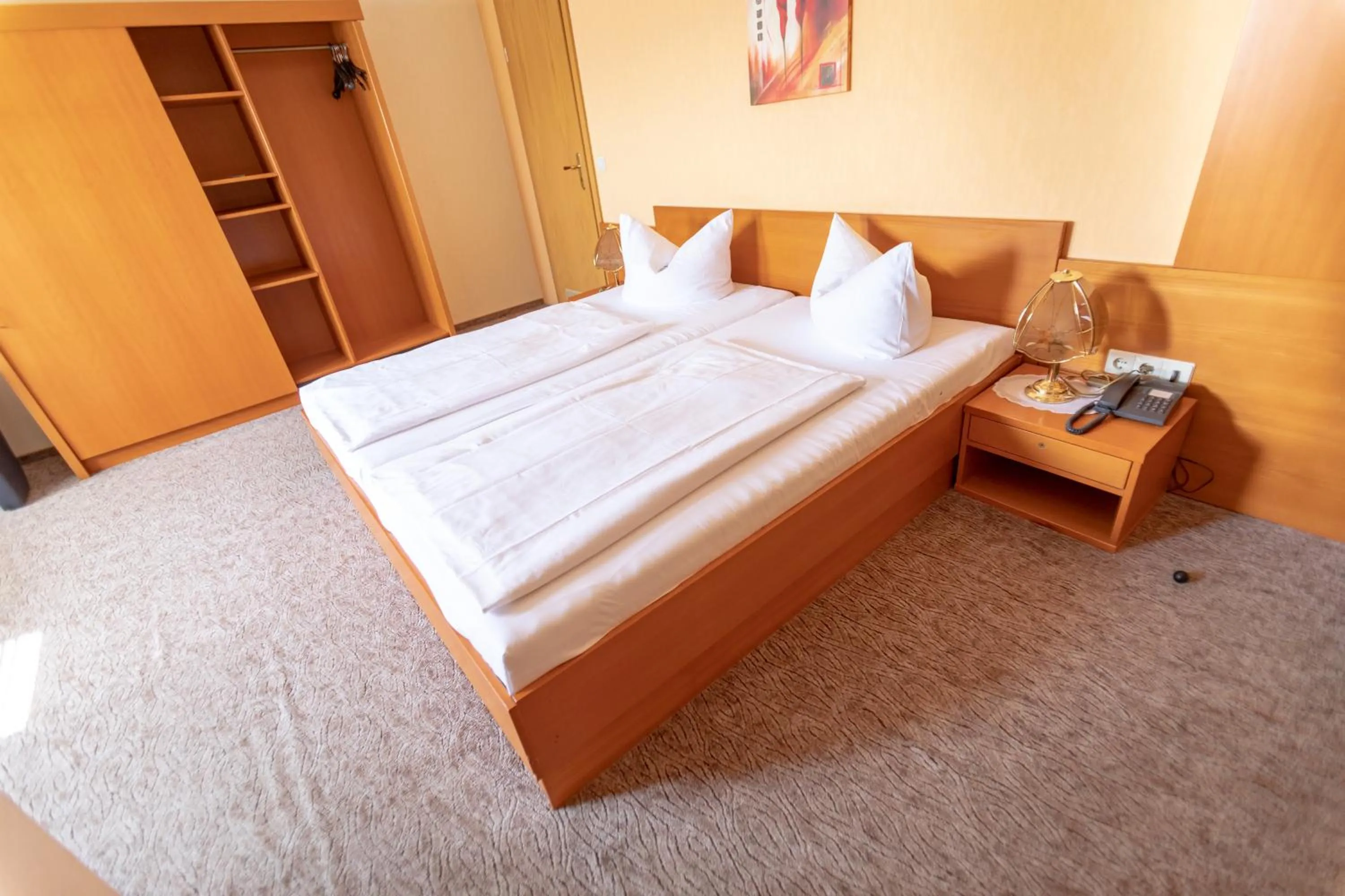 Photo of the whole room, Bed in Parkhotel Pretzsch