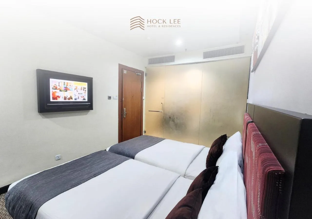 Bed in Hock Lee Hotel & Residences