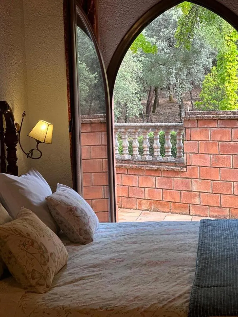 View (from property/room), Bed in Hotel Rural Convento Santa Maria de la Sierra