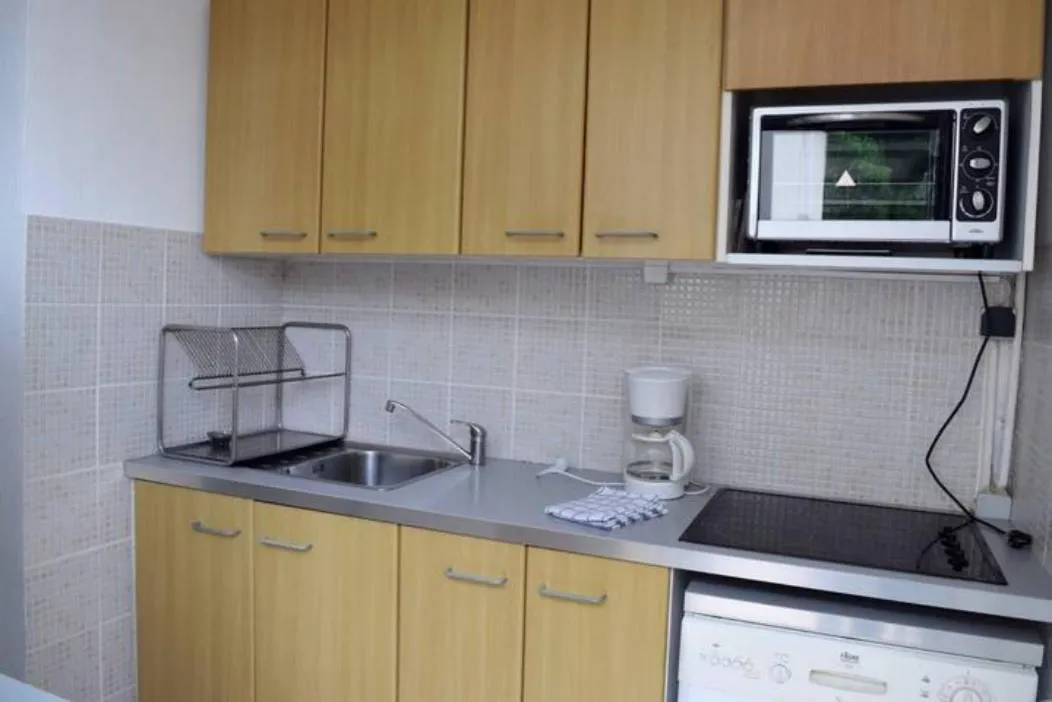 Kitchen or kitchenette in Hotel L'Orangeraie