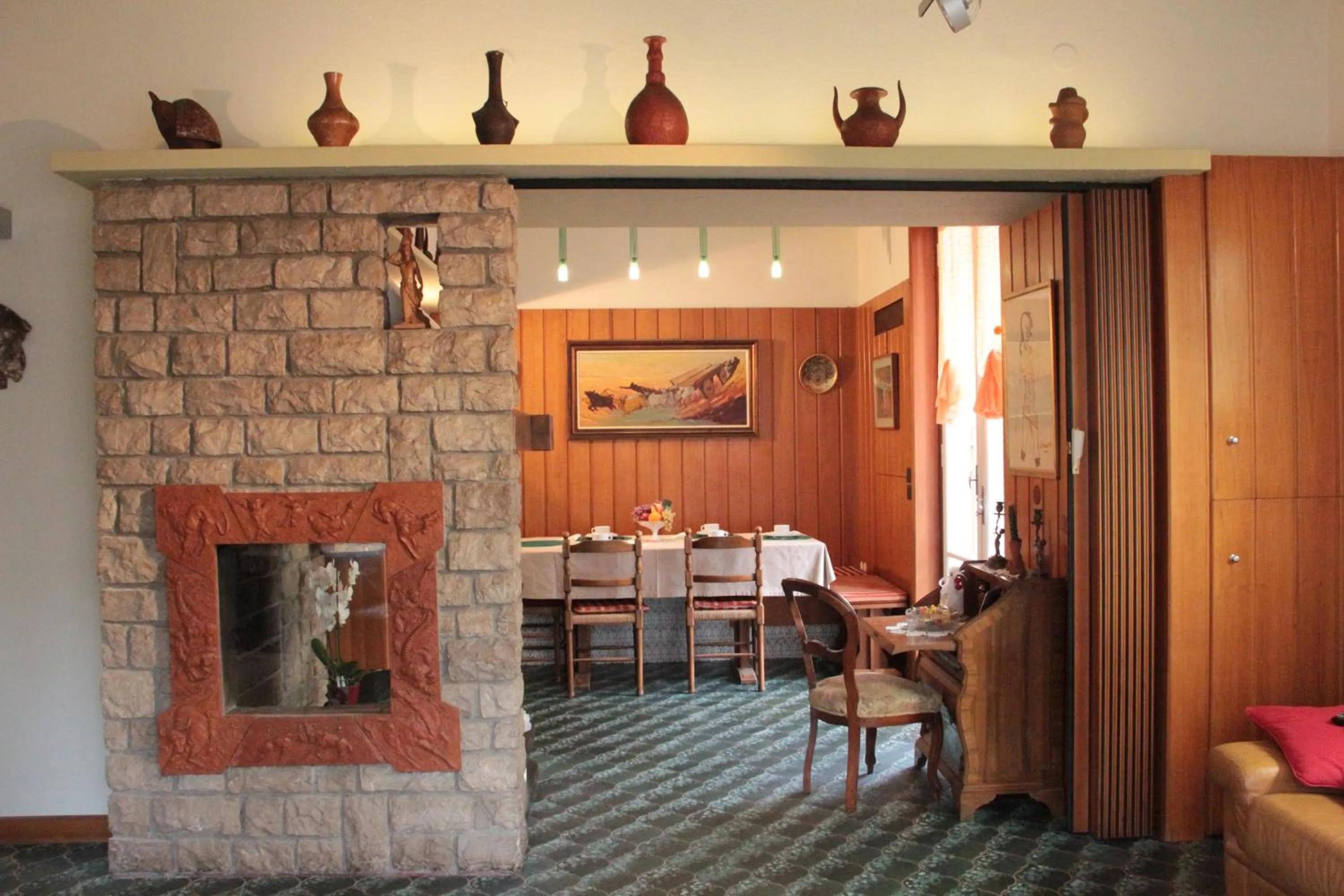 Communal lounge/ TV room in B&B Villa Mirella