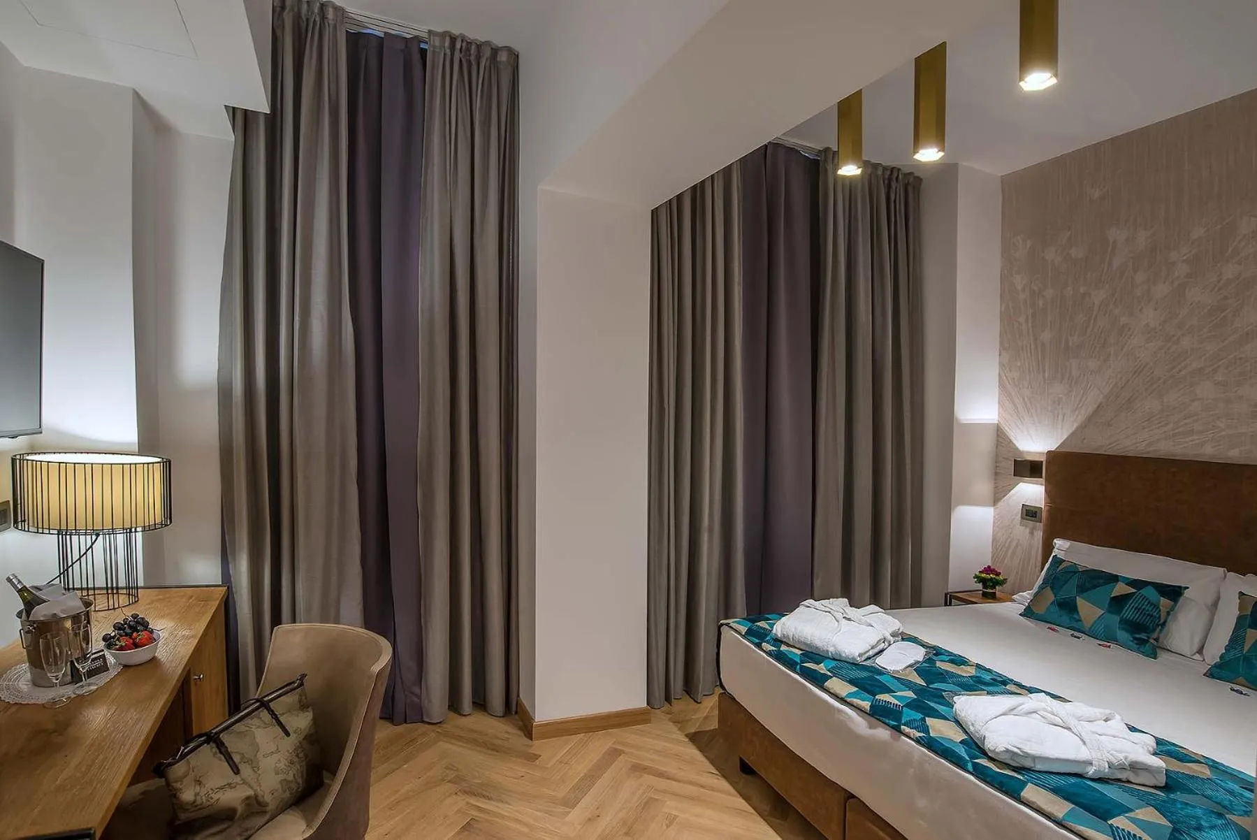 Photo of the whole room, Bed in Navona Essence Hotel