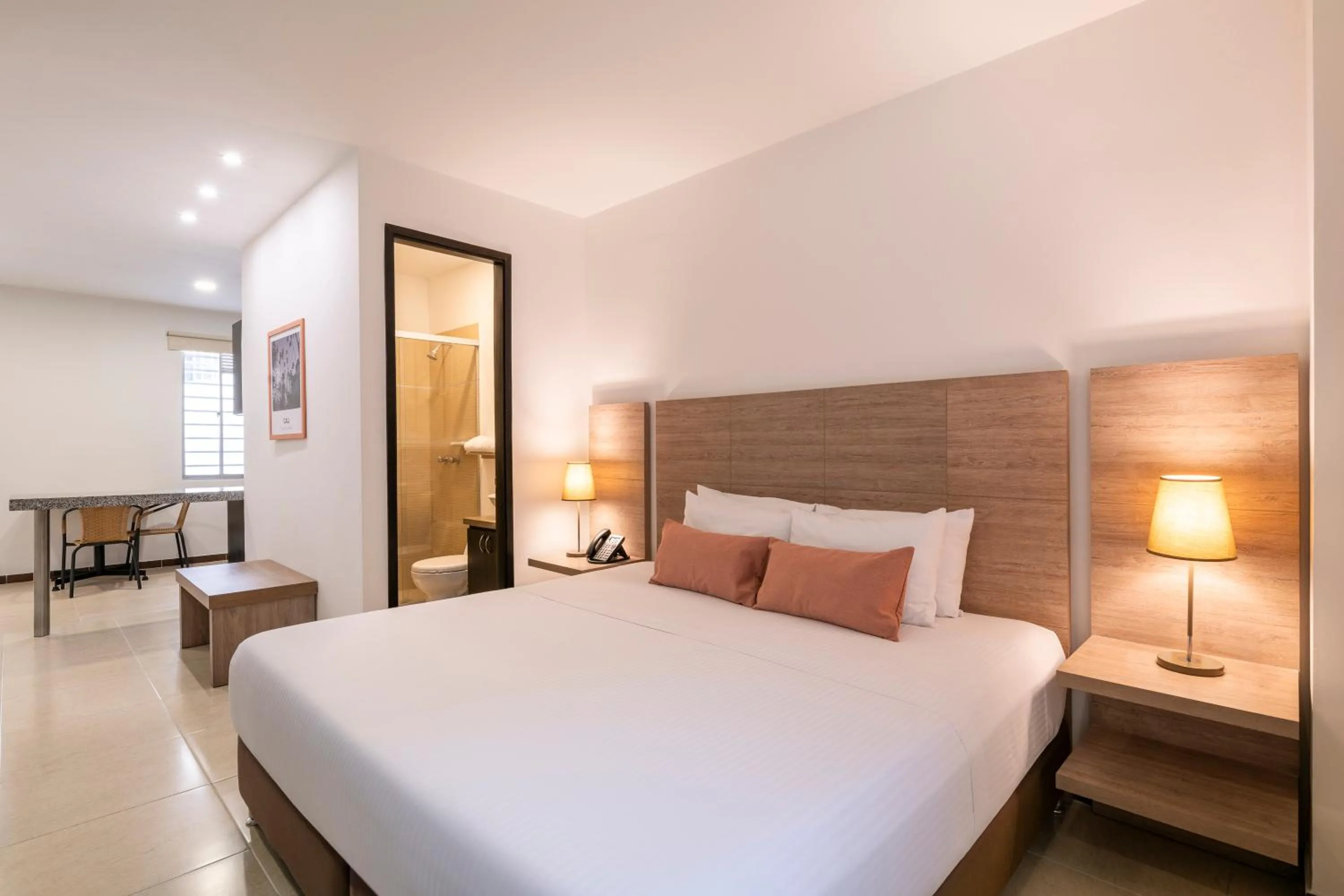 Seating area, Bed in Hotel MS Pacifico Chipichape