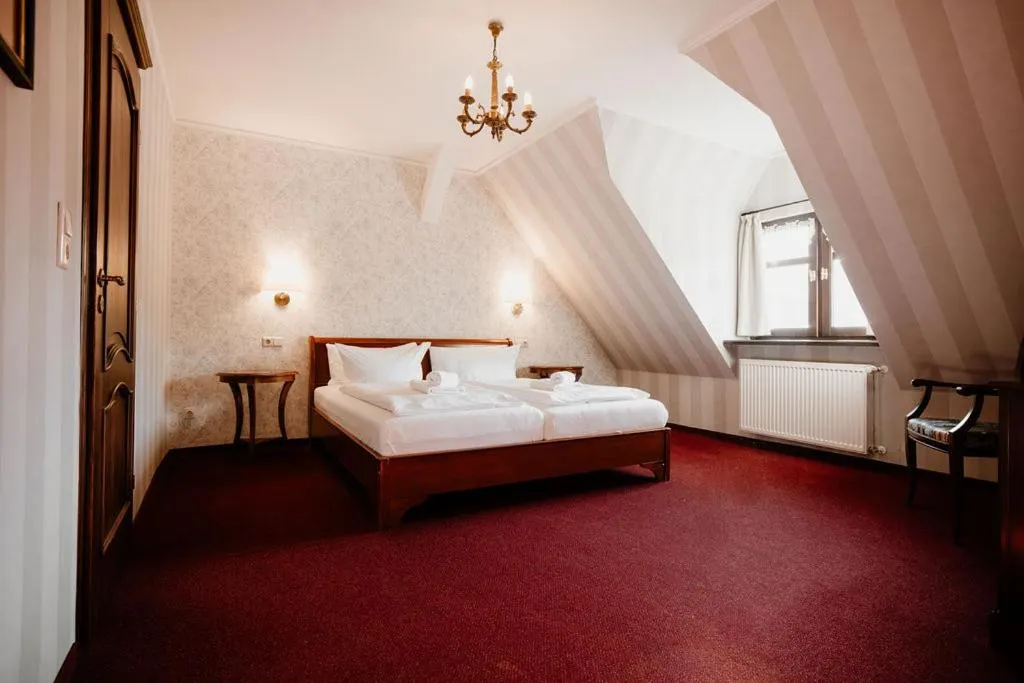 Bed in Schlosshotel Stecklenberg