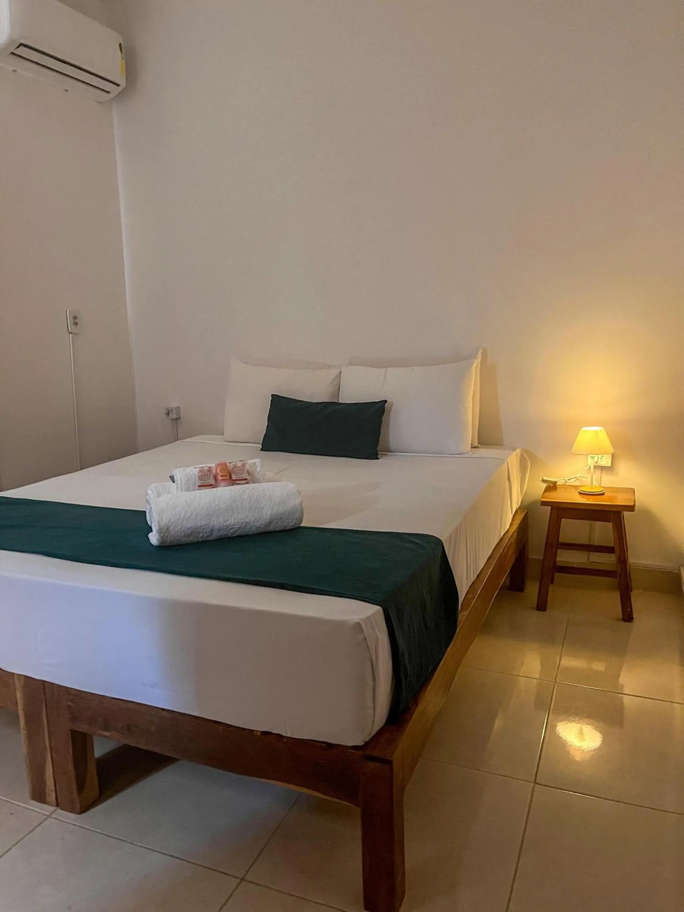 Bed in Pousada Enero