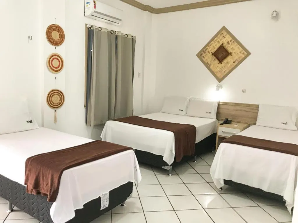 Bed in Pousada do Mingote