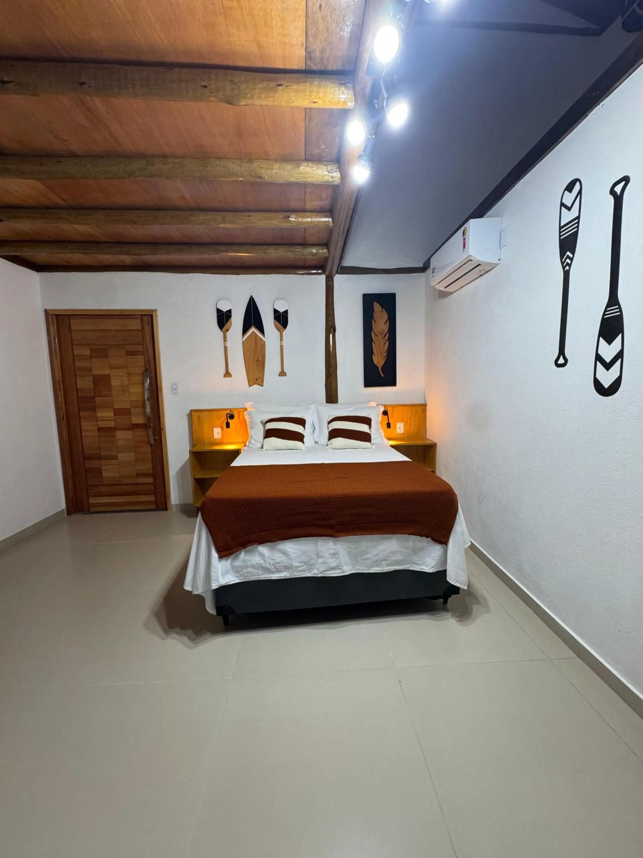 Bed in Pousada Tropical Araçatiba