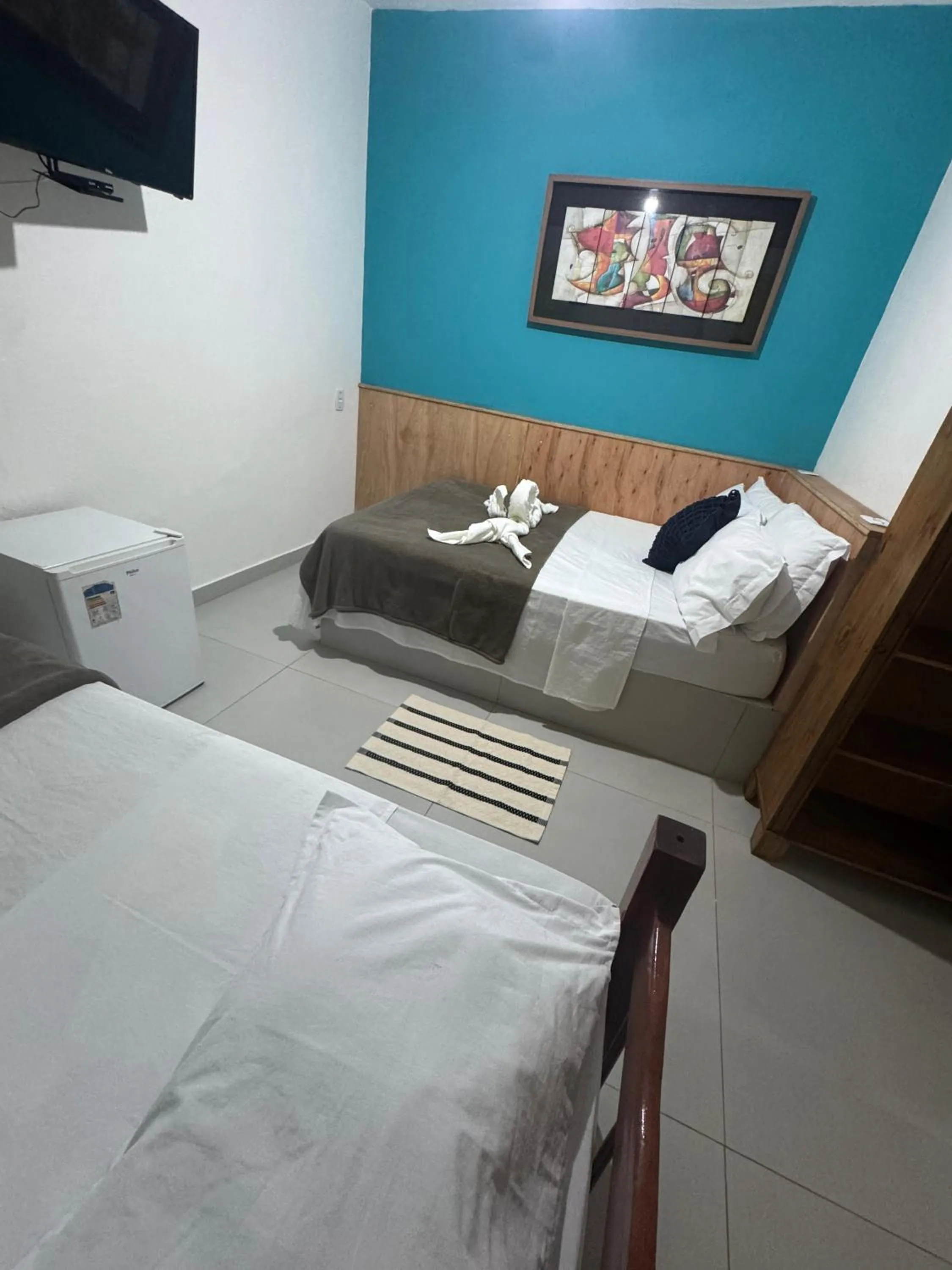 Bed in Pousada Tropical Araçatiba