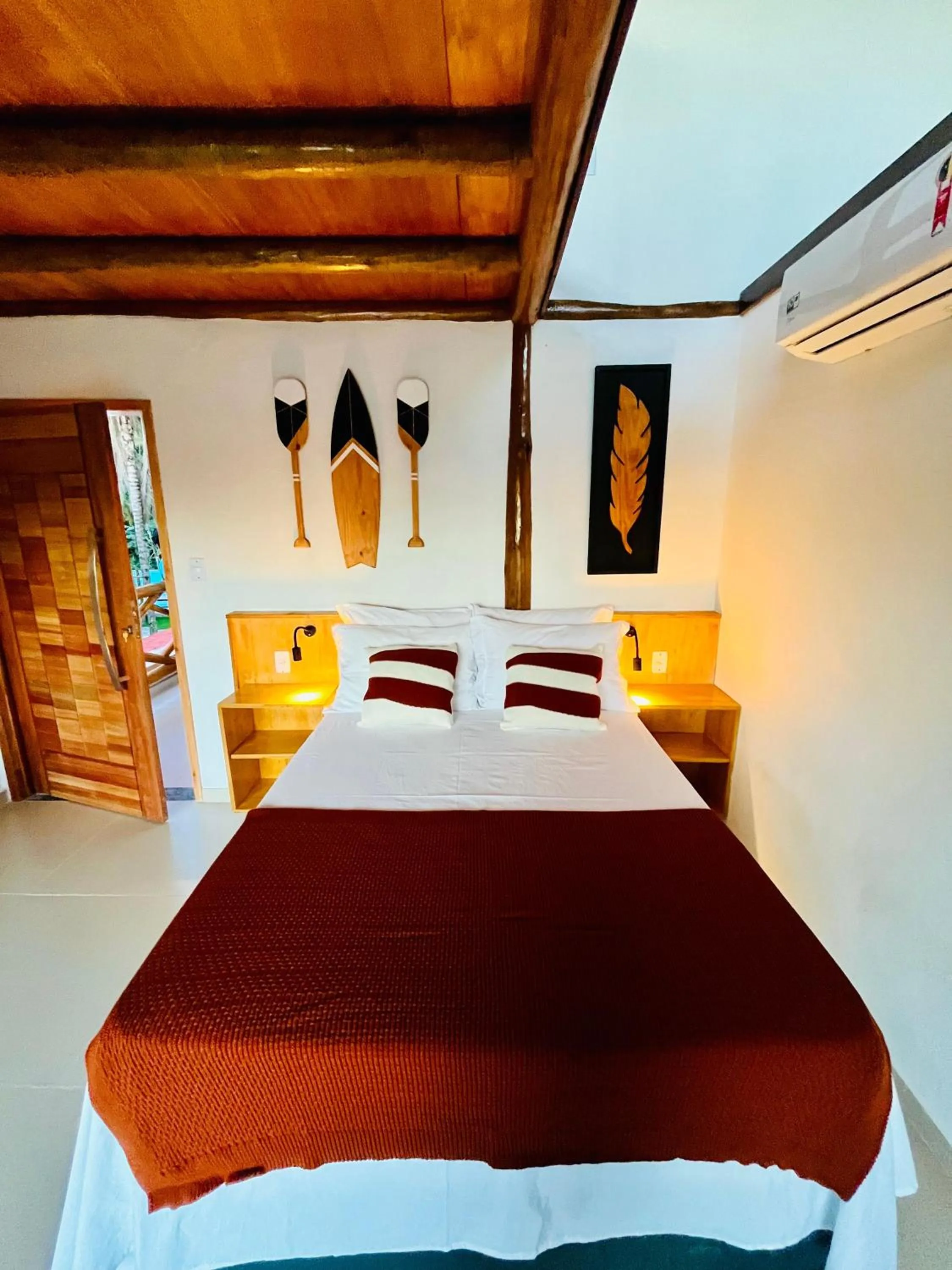 Bed in Pousada Tropical Araçatiba