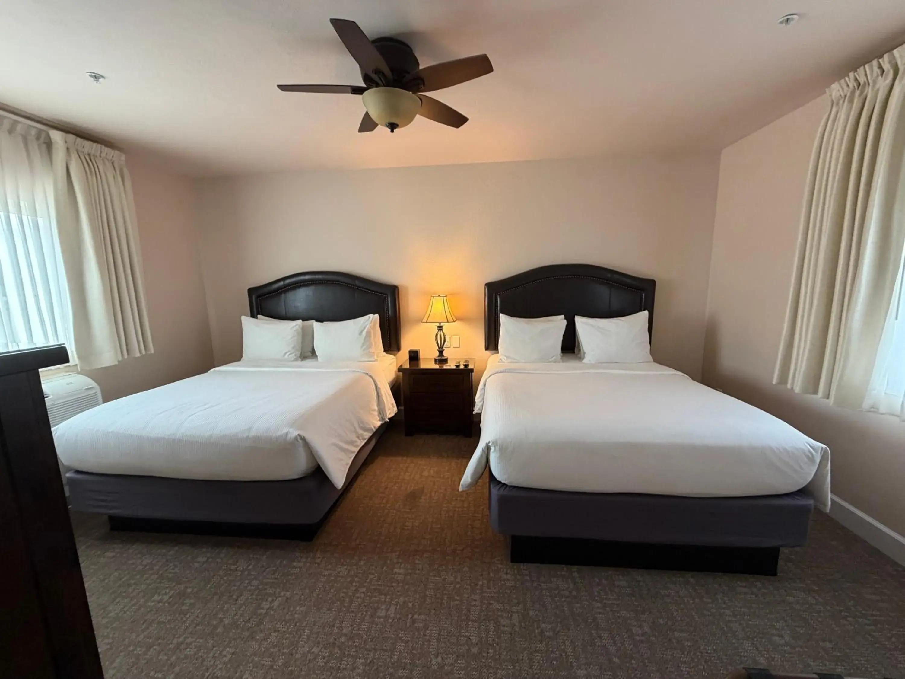 Deluxe Queen Suite in Resort at Eagle Point Golf Club Lodging Deluxe Queen Suite in Resort at Eagle Point Golf Club Lodging