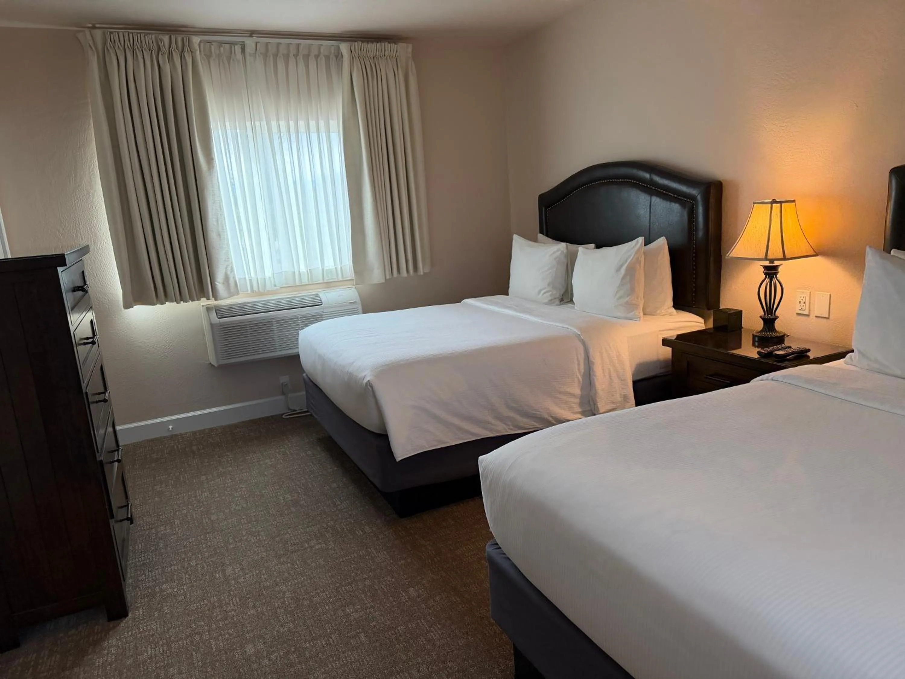 Bed in Resort at Eagle Point Golf Club Lodging