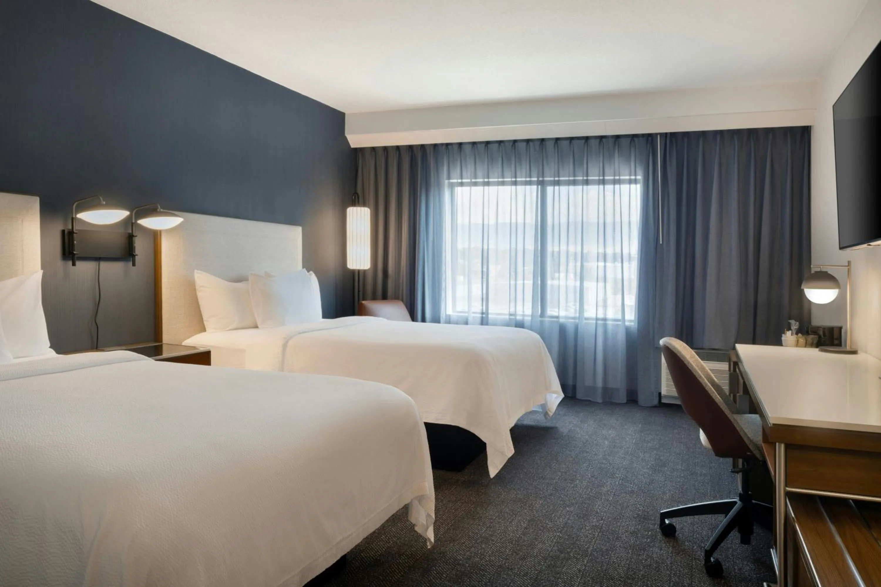 Photo of the whole room, Bed in Courtyard Casper