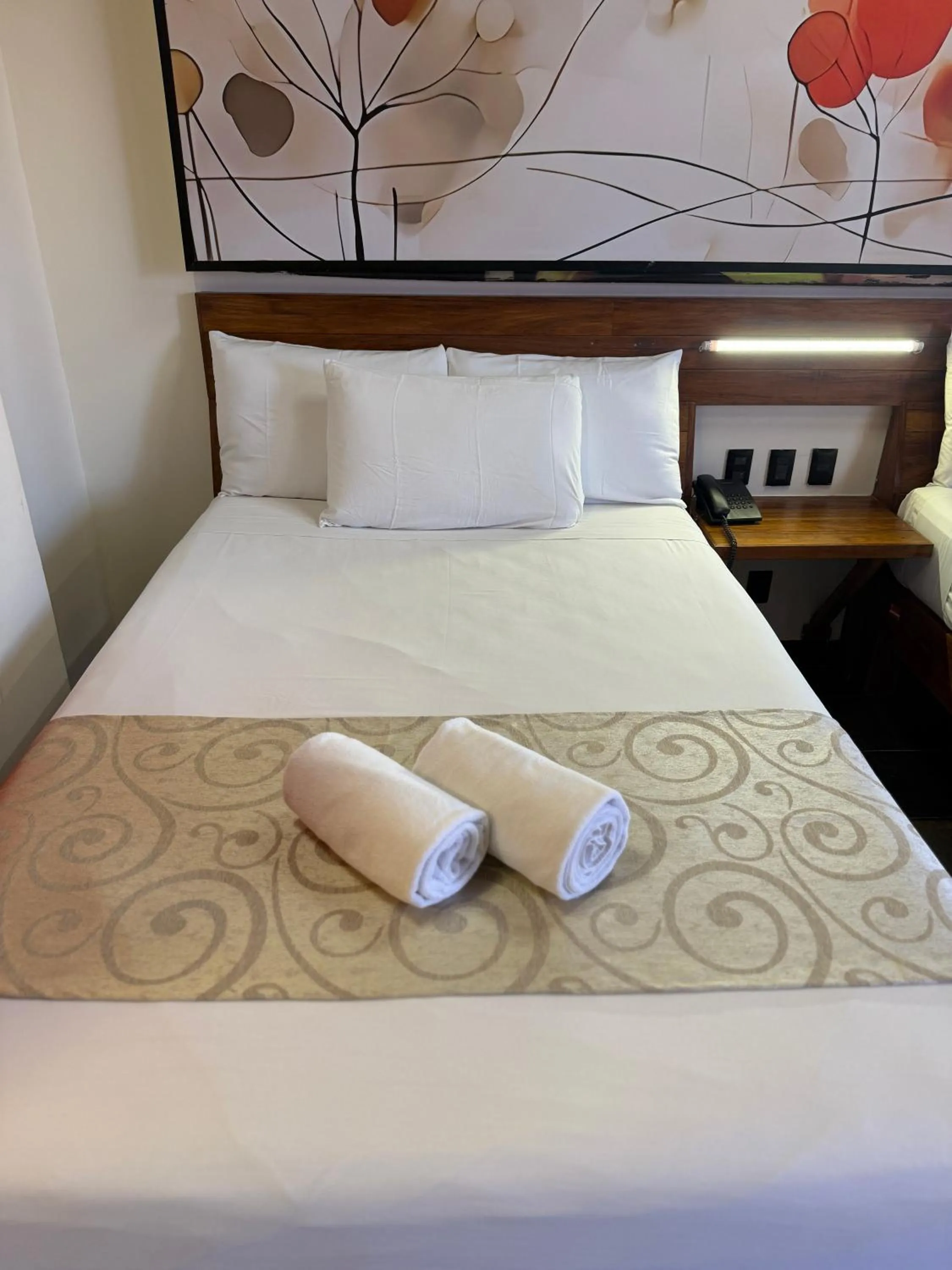 Bed in Reina Roja Hotel Boutique
