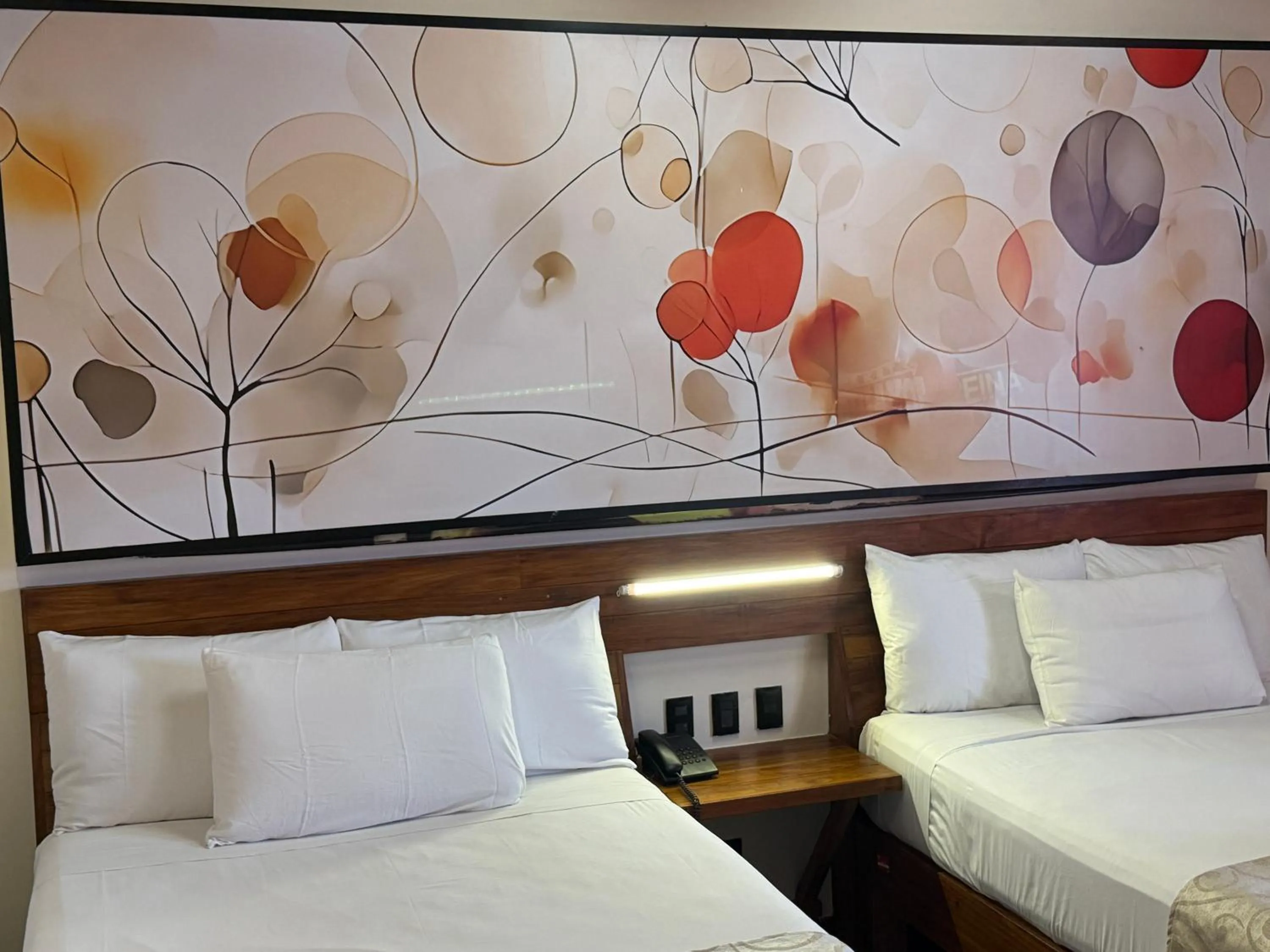 Bed in Reina Roja Hotel Boutique