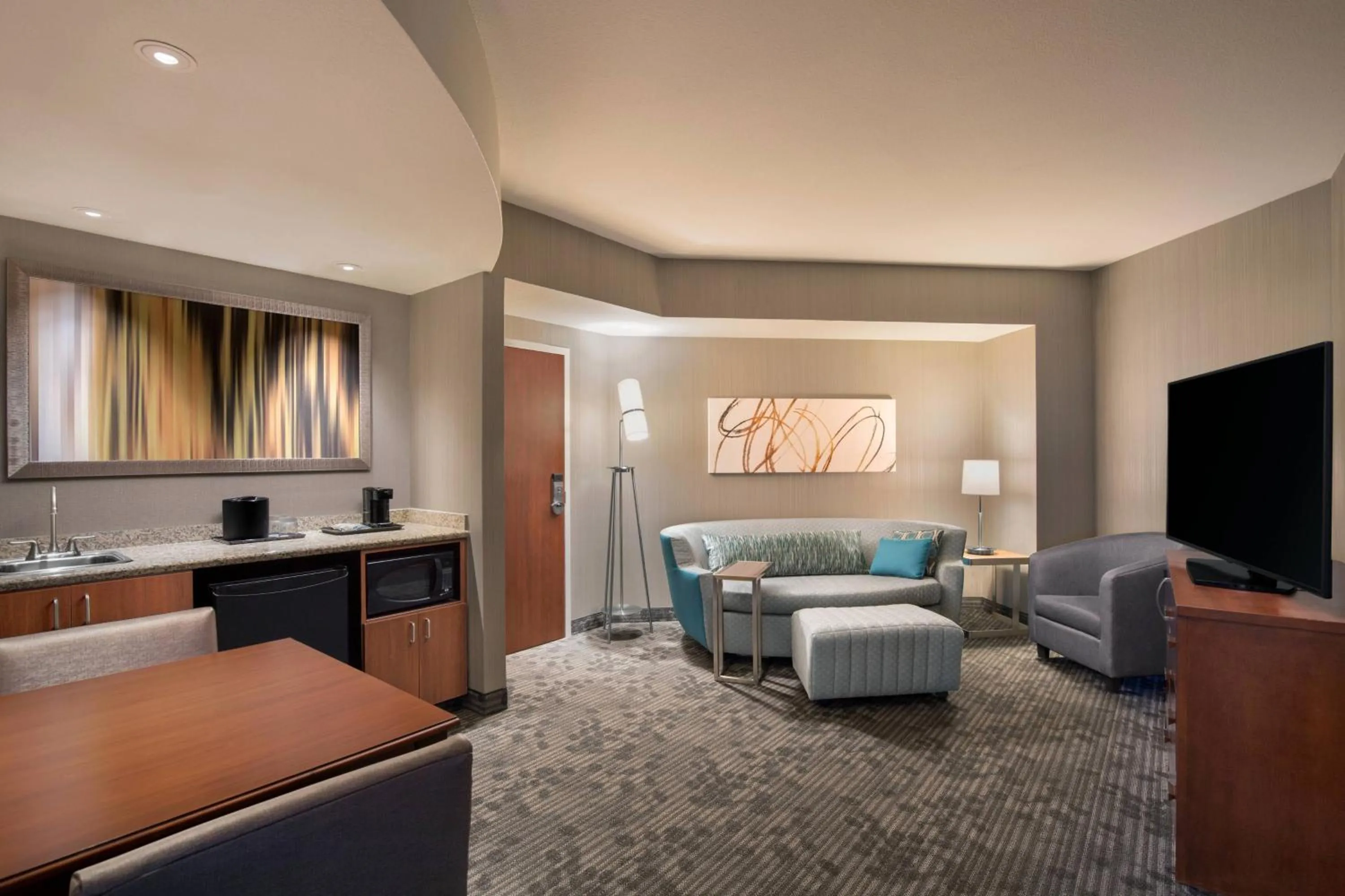 Living room in Courtyard by Marriott Dallas Allen at Allen Event Center