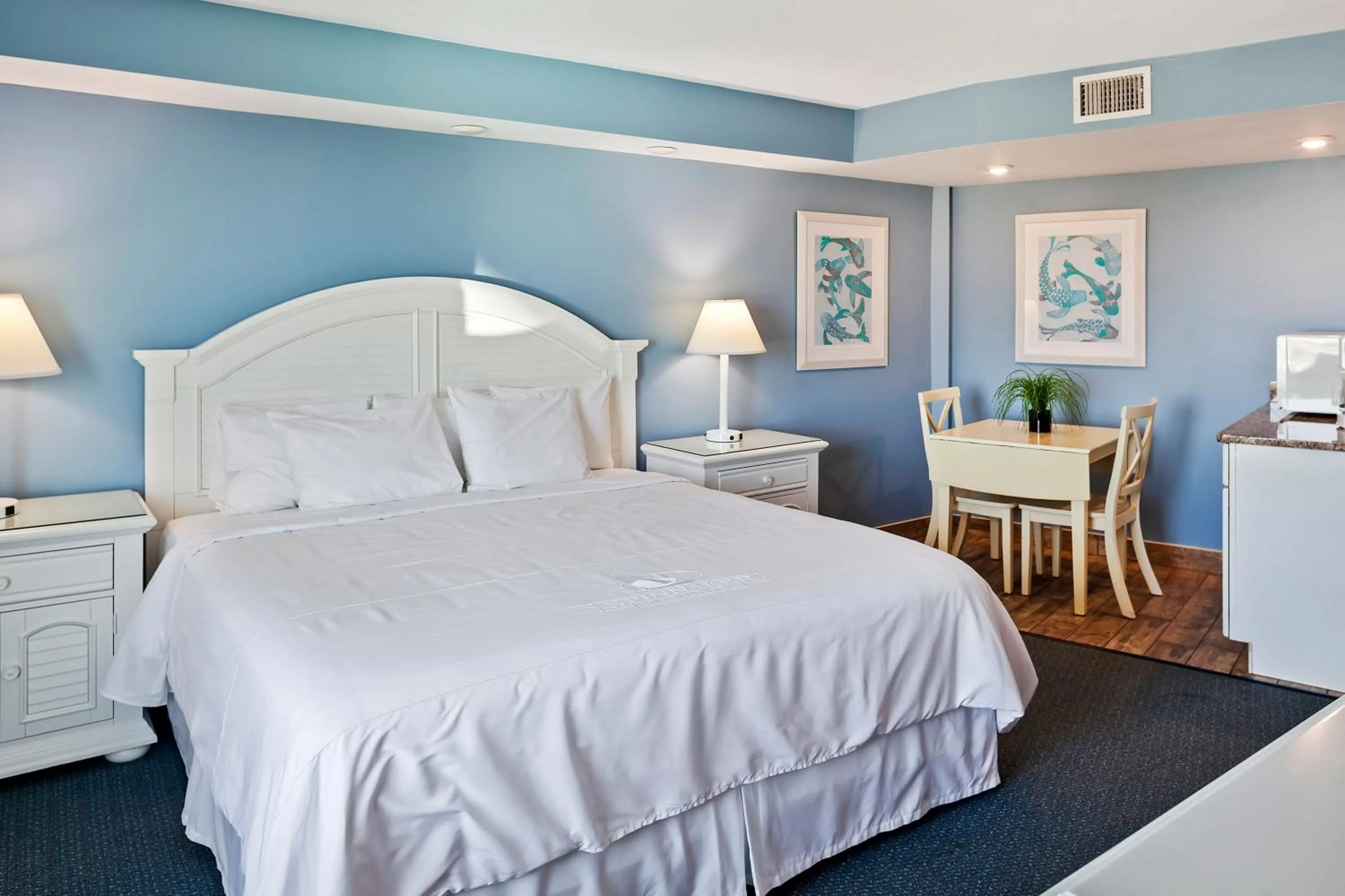 Bed in Royal Floridian Resort by Spinnaker