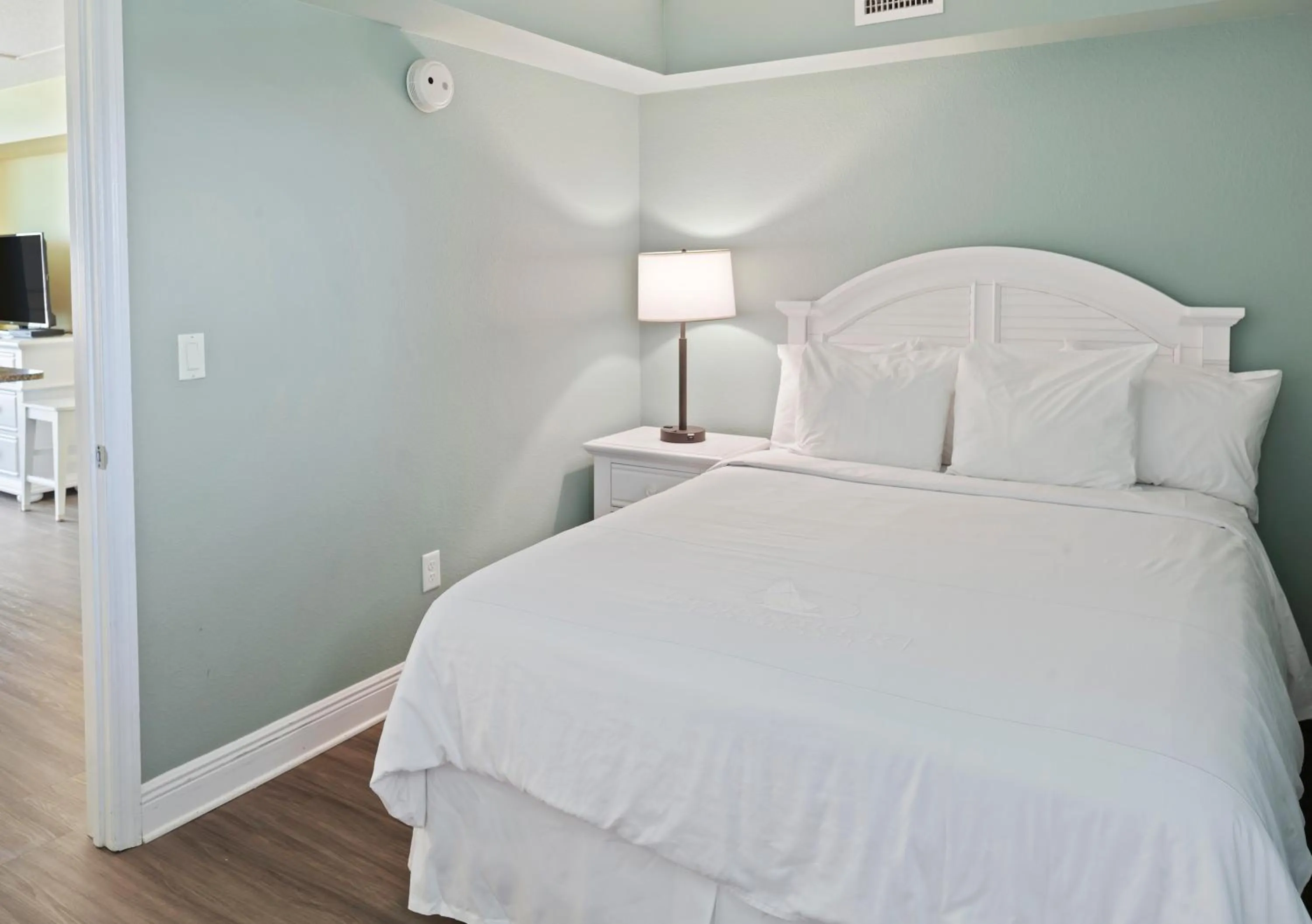 Bed in Royal Floridian Resort by Spinnaker