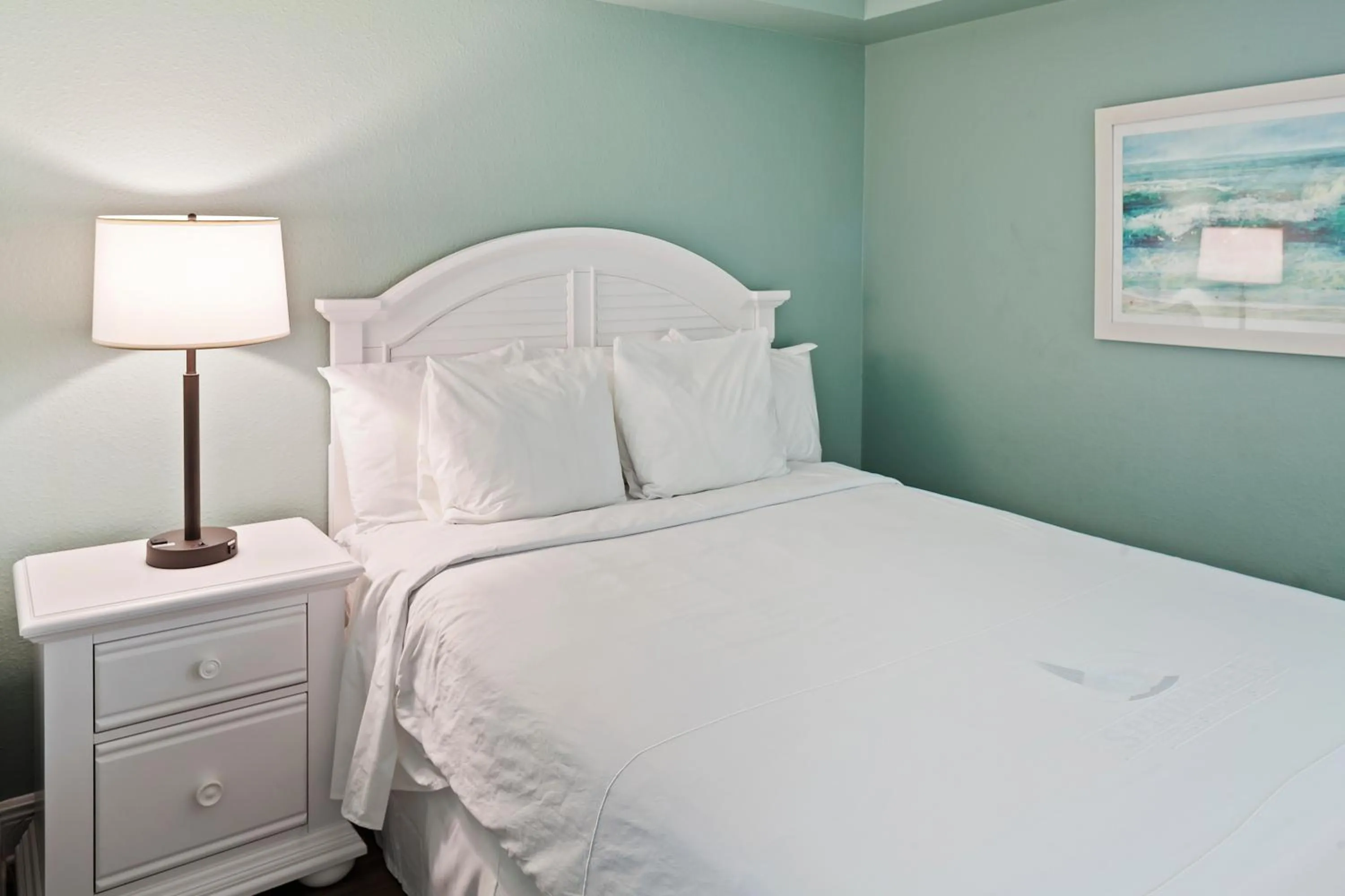 Bed in Royal Floridian Resort by Spinnaker