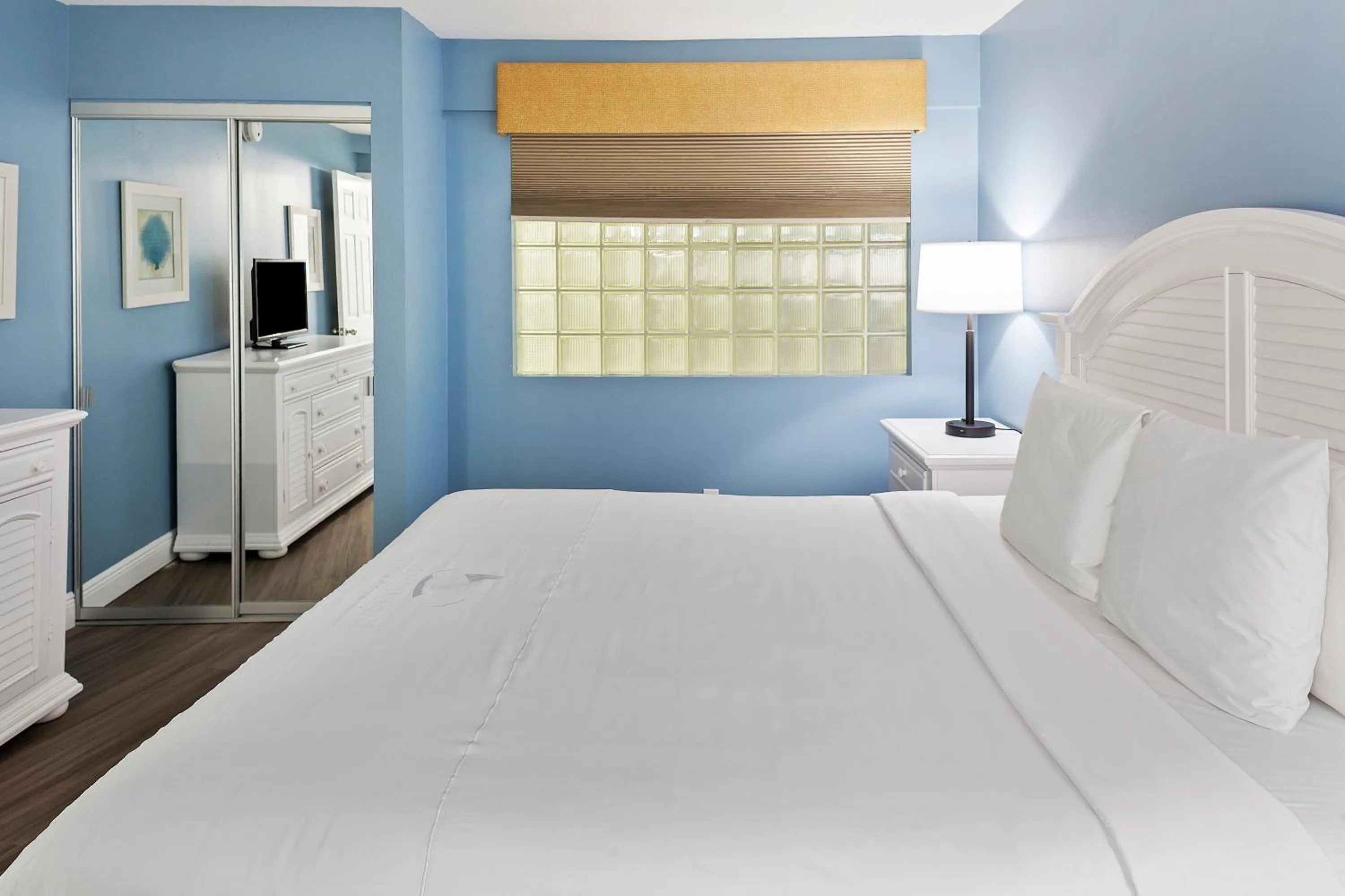 Bed in Royal Floridian Resort by Spinnaker