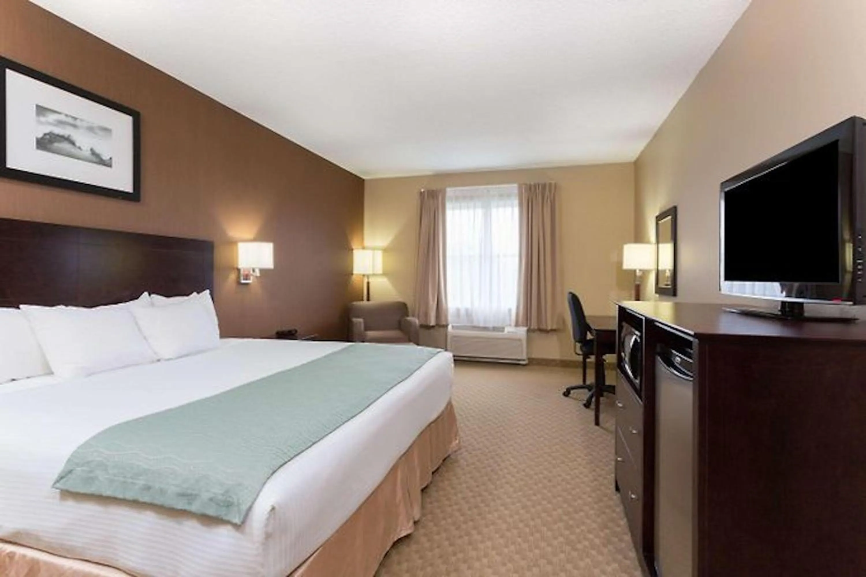 Photo of the whole room, Bed in Holiday Inn Express & Suites Palm Coast - I-95