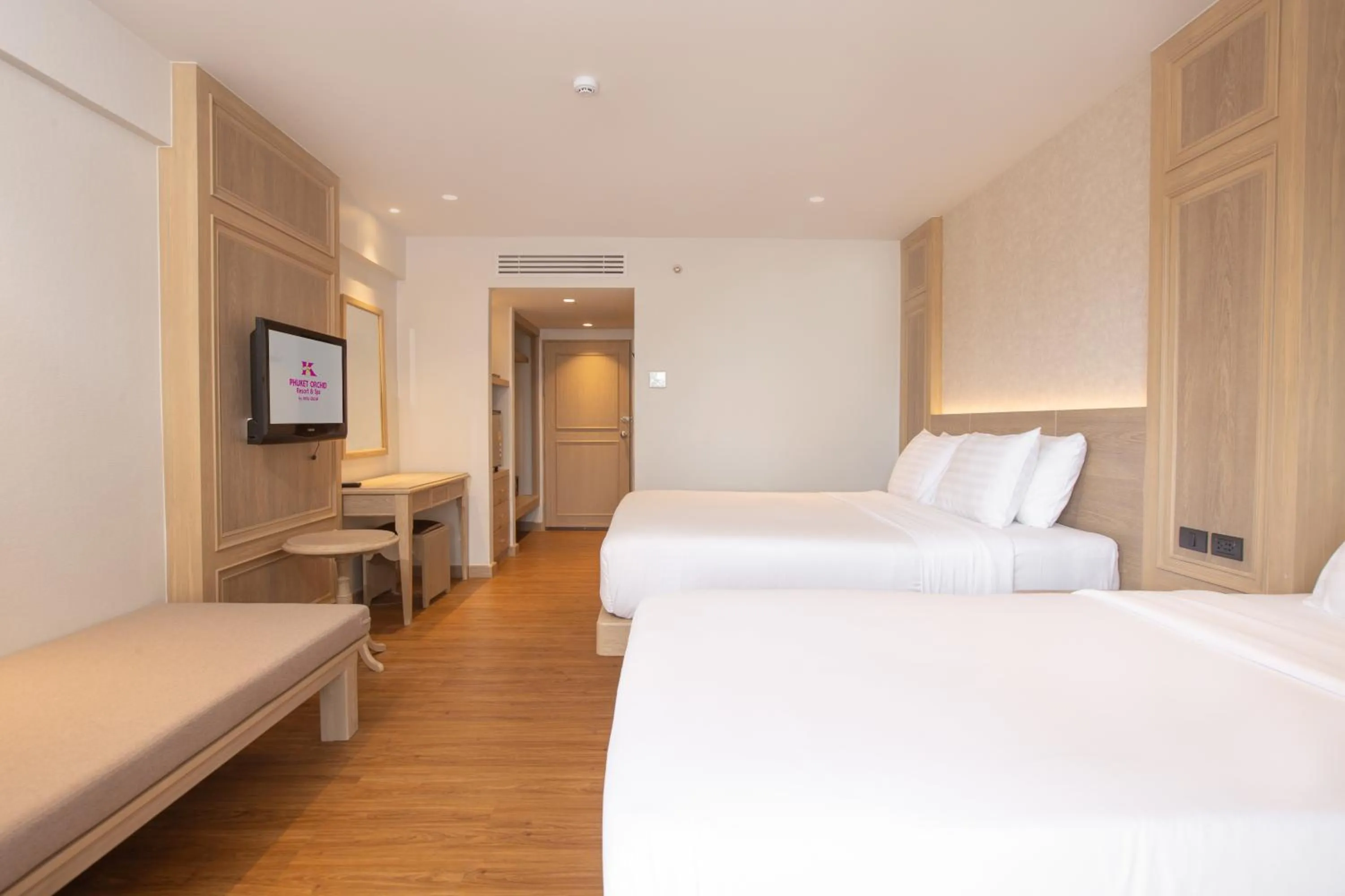 Bed in Phuket Orchid Resort and Spa