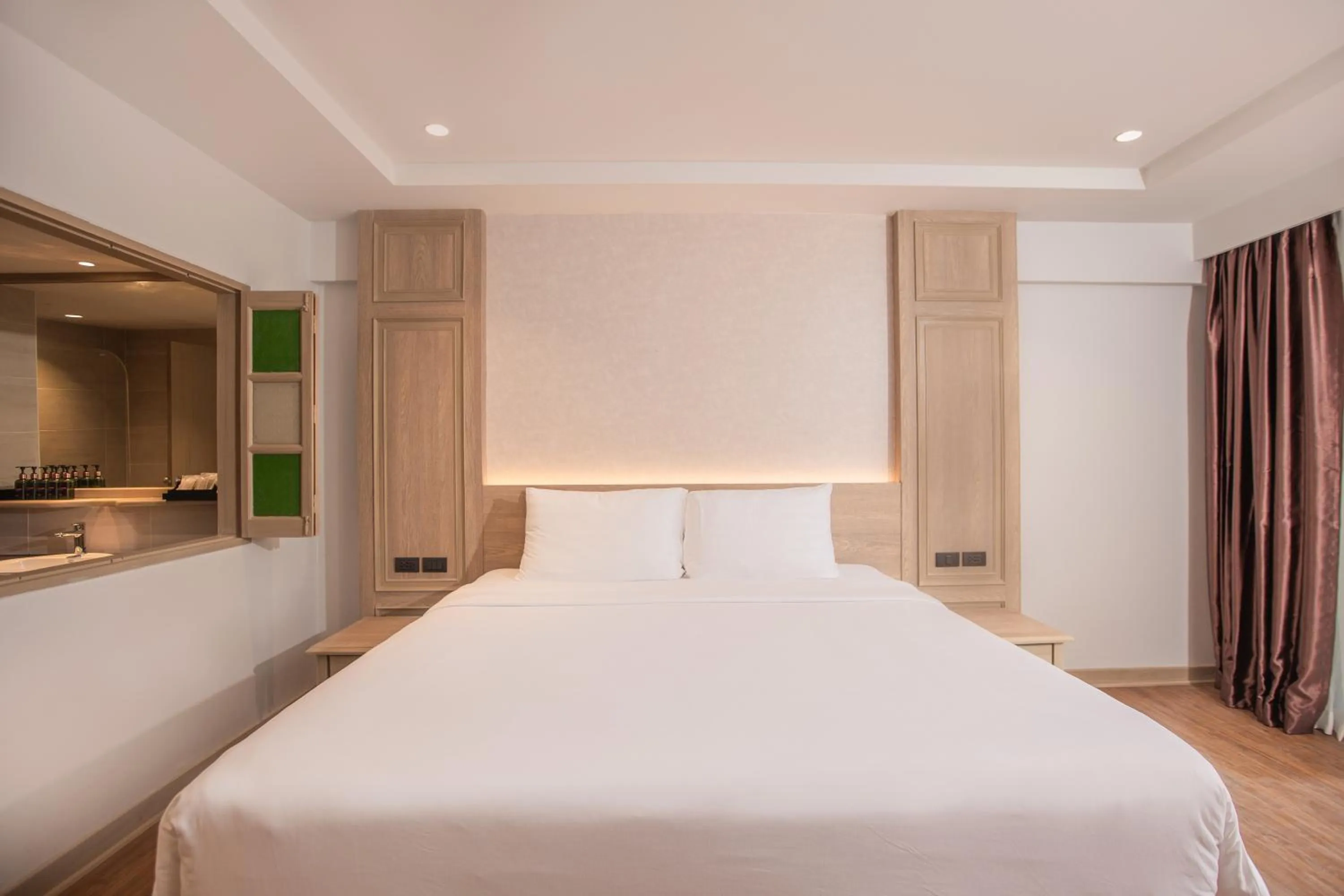 Bed in Phuket Orchid Resort and Spa