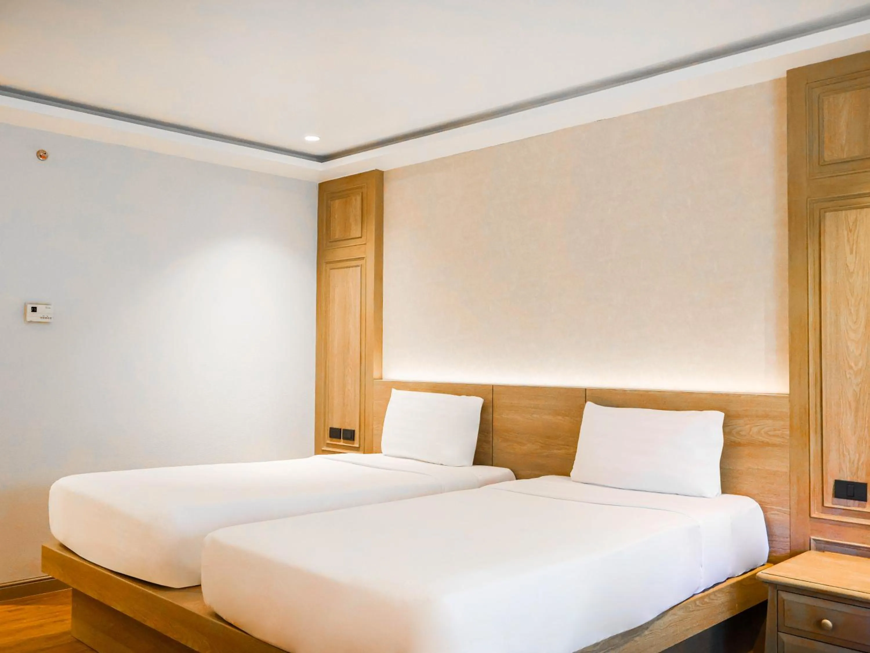 Bed in Phuket Orchid Resort and Spa