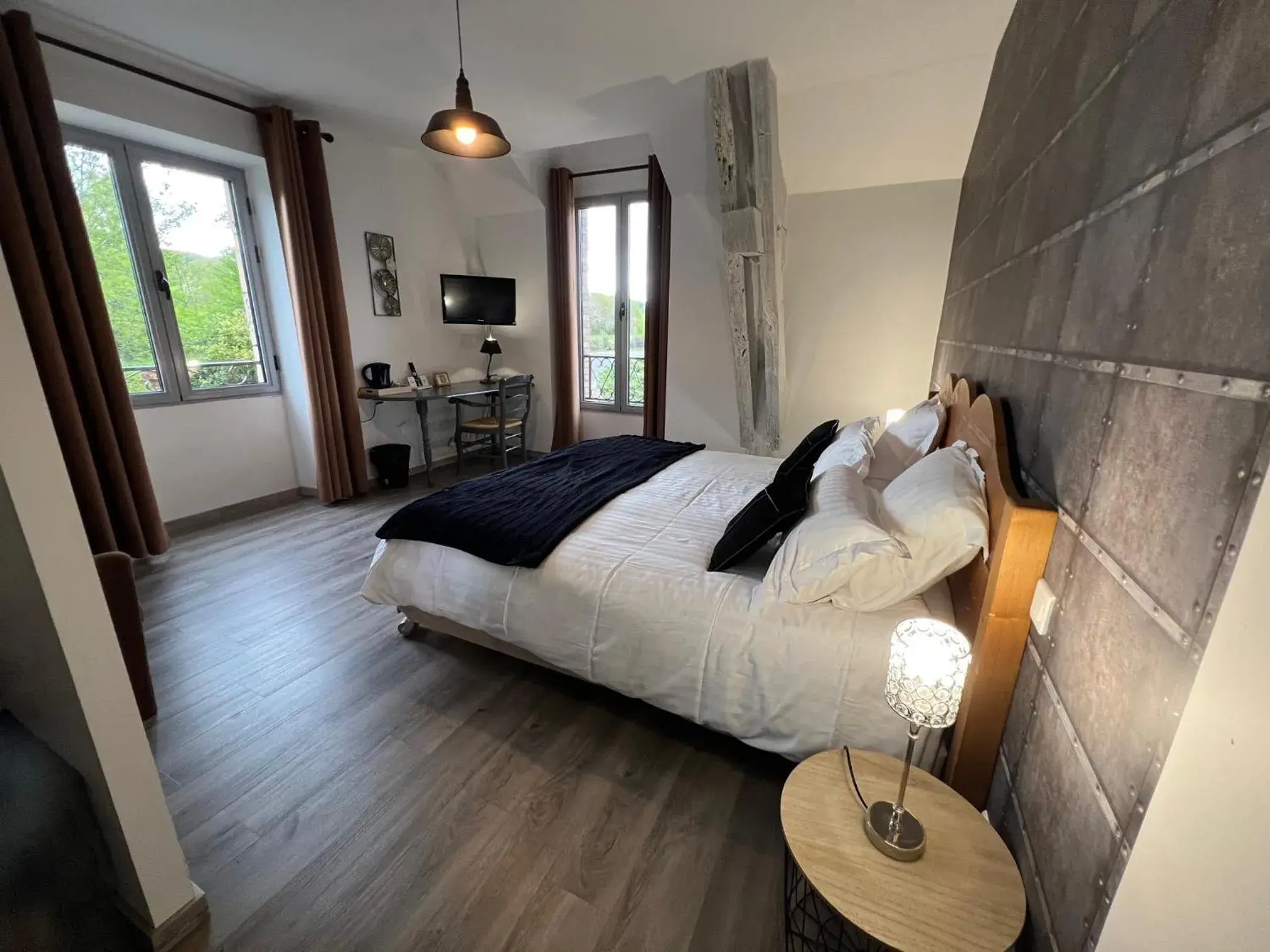 Triple Room in Logis Hôtel Auberge de Cartassac Triple Room in Logis Hôtel Auberge de Cartassac