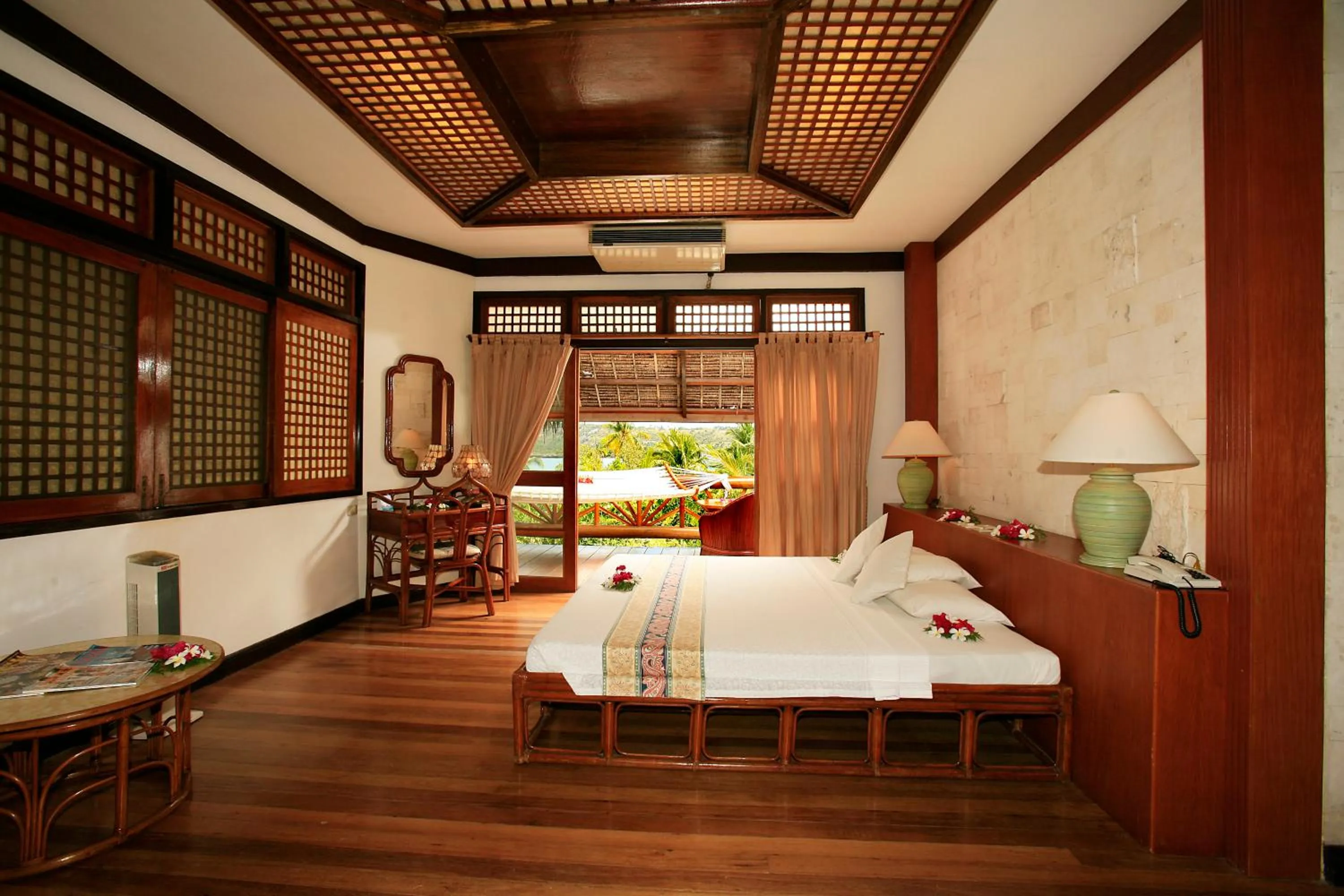 Photo of the whole room, Bed in Badian Island Wellness Resort