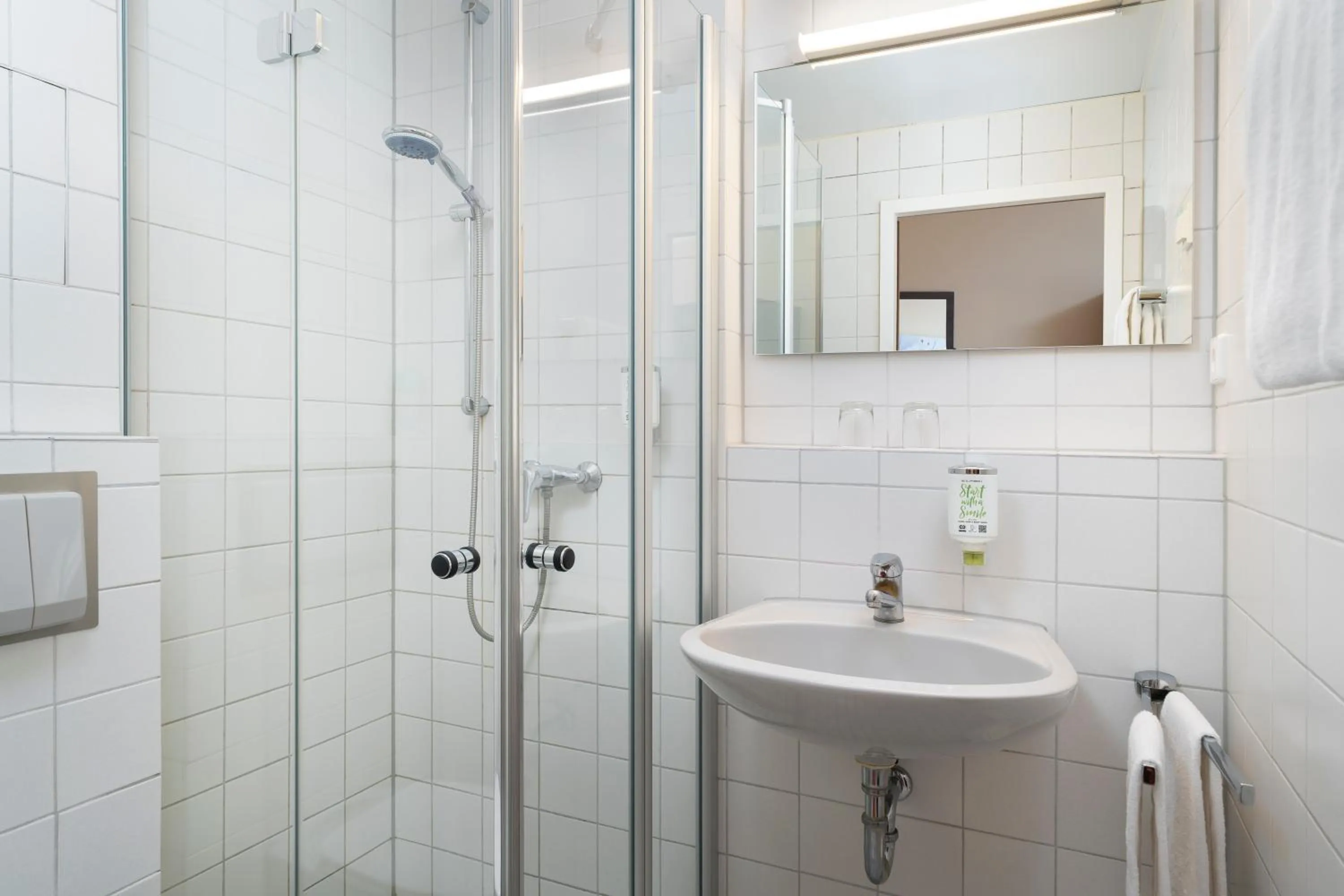 Bathroom in ates Hotel Lampertheim by AURUM