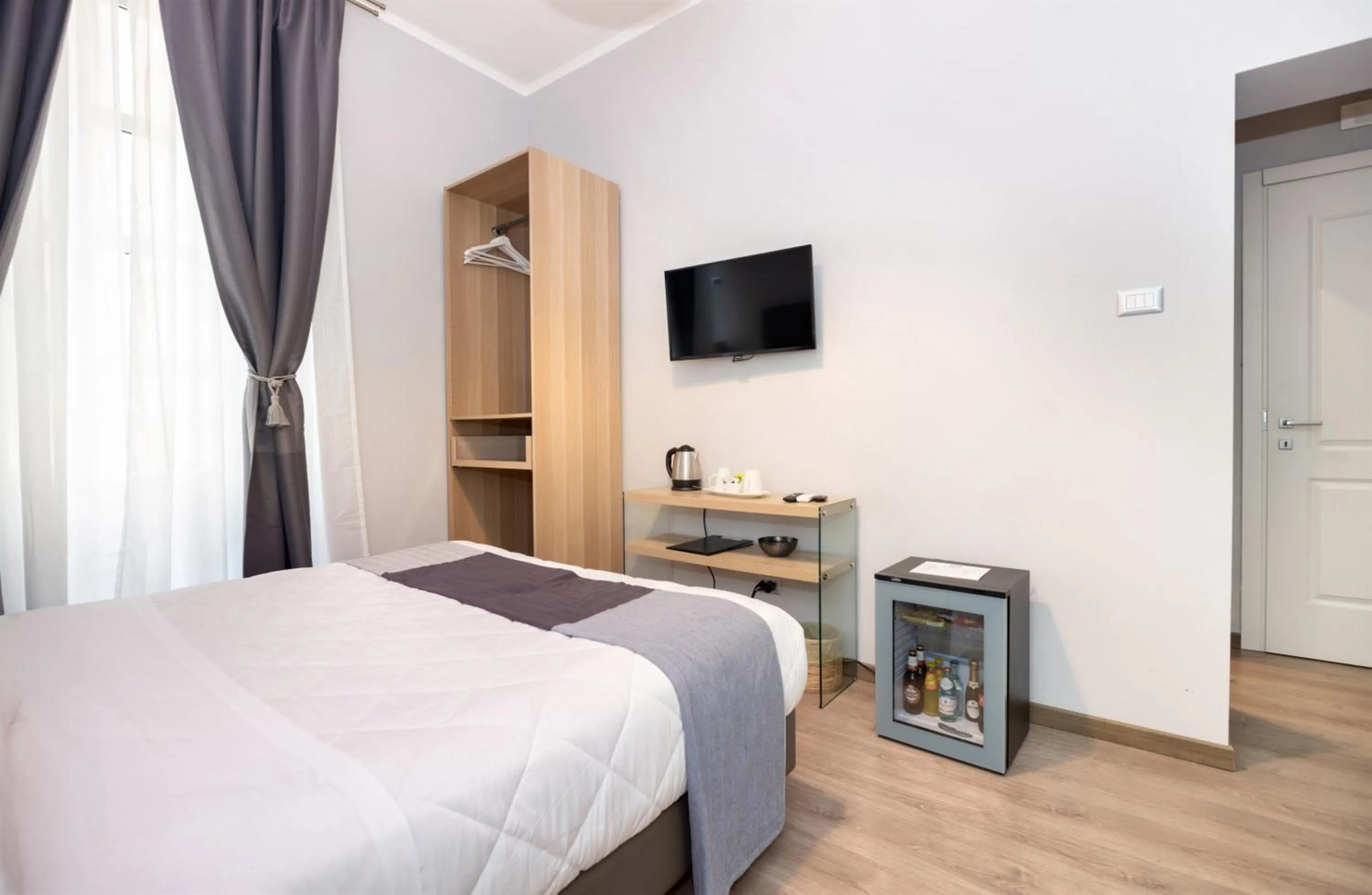 Bed in Clementi 18 Suites Rome