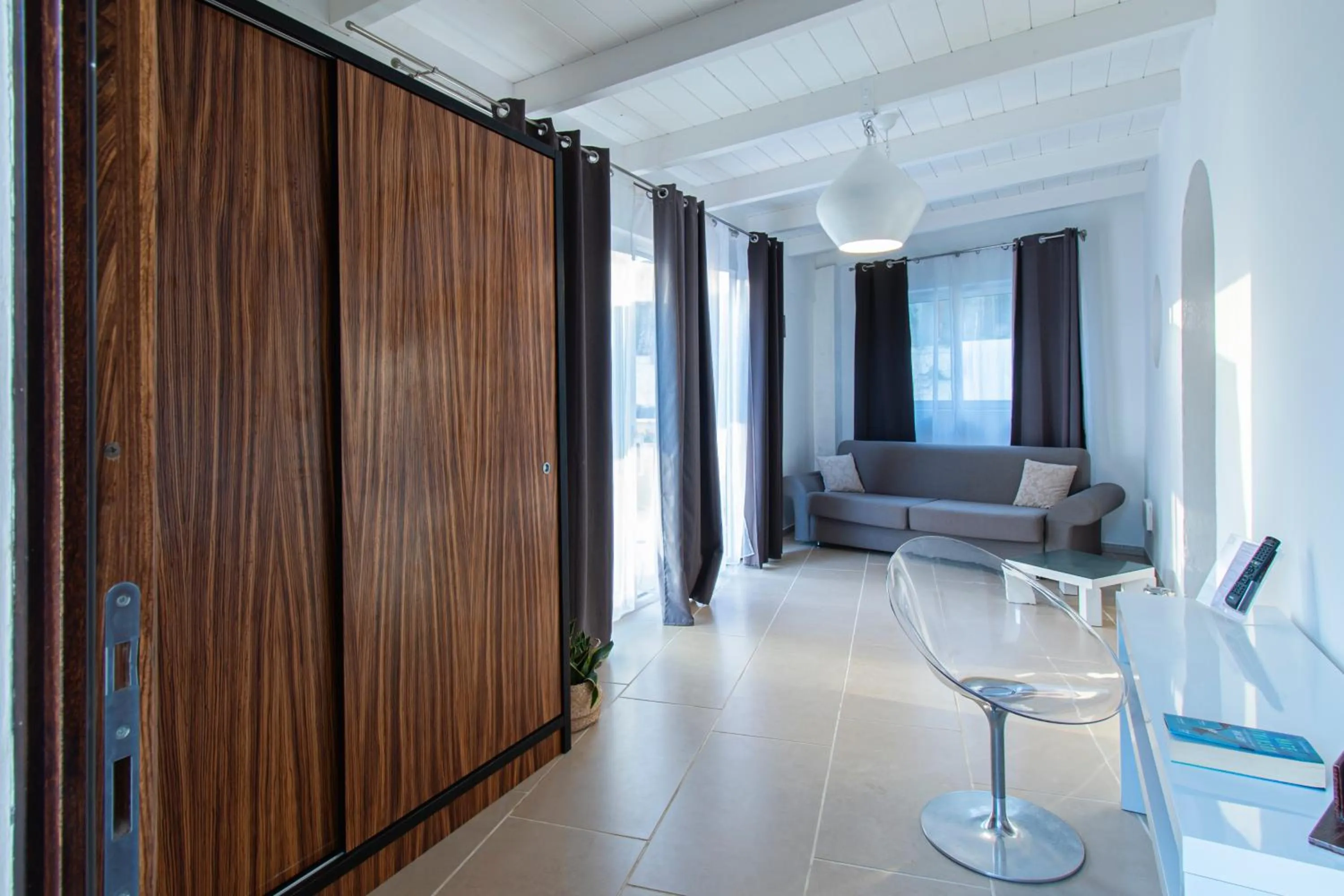 Communal lounge/ TV room in Marina 10 Design Hotel & SPA