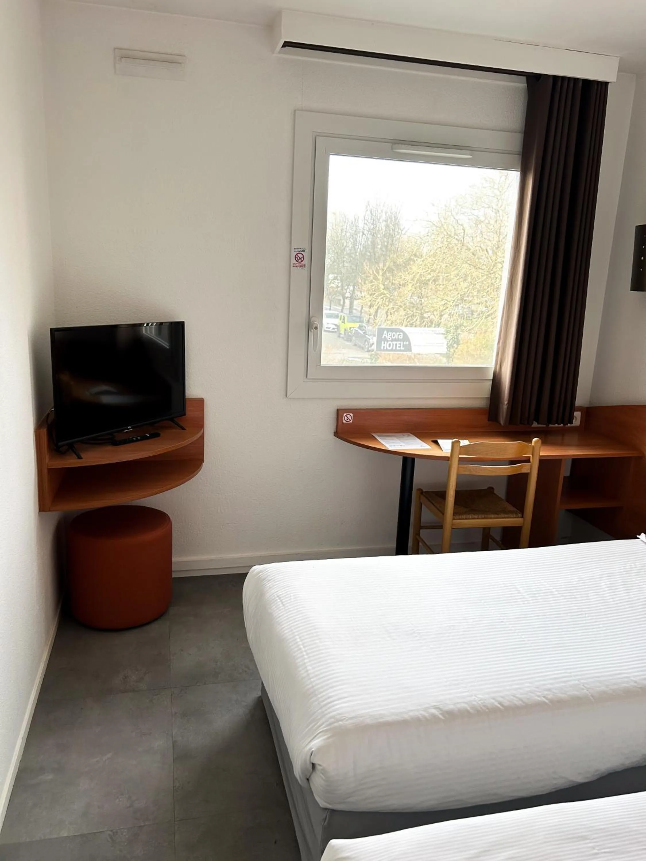 Seating area, Bed in Hôtel AKENA Nantes Orvault - Ouest