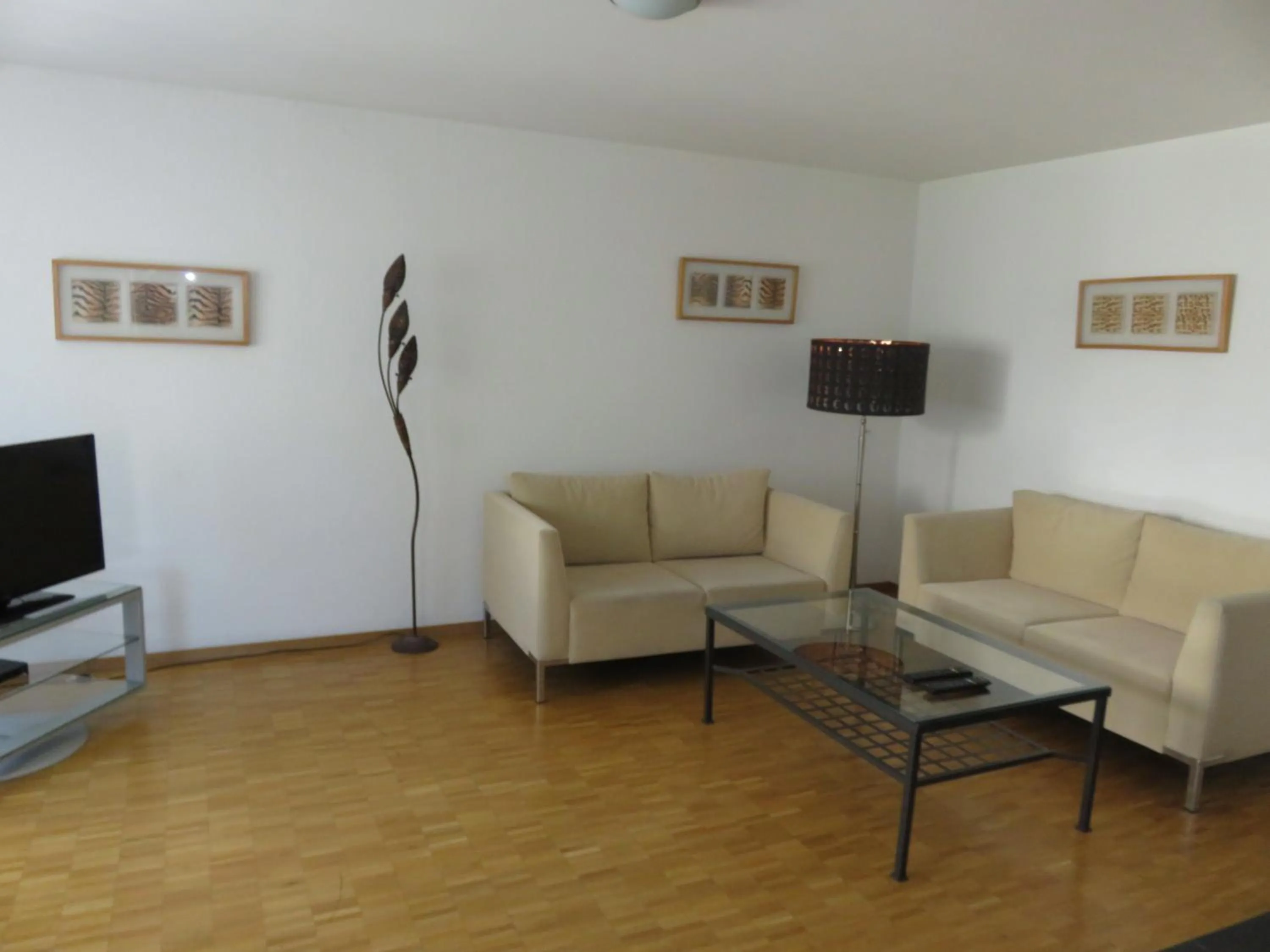 Living room in Swiss Star District 11 - Self Check-In