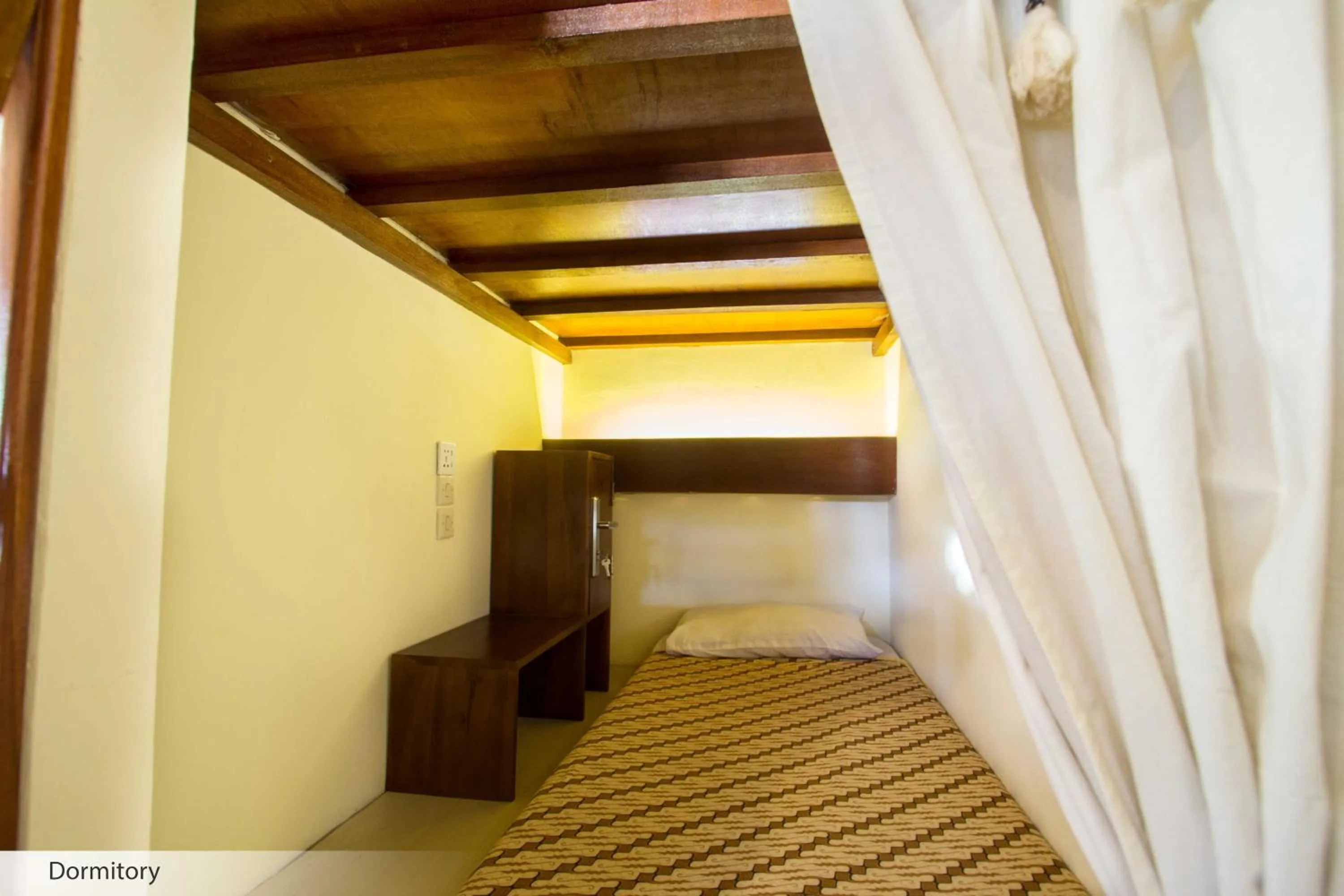 Bed in Duta Guest House