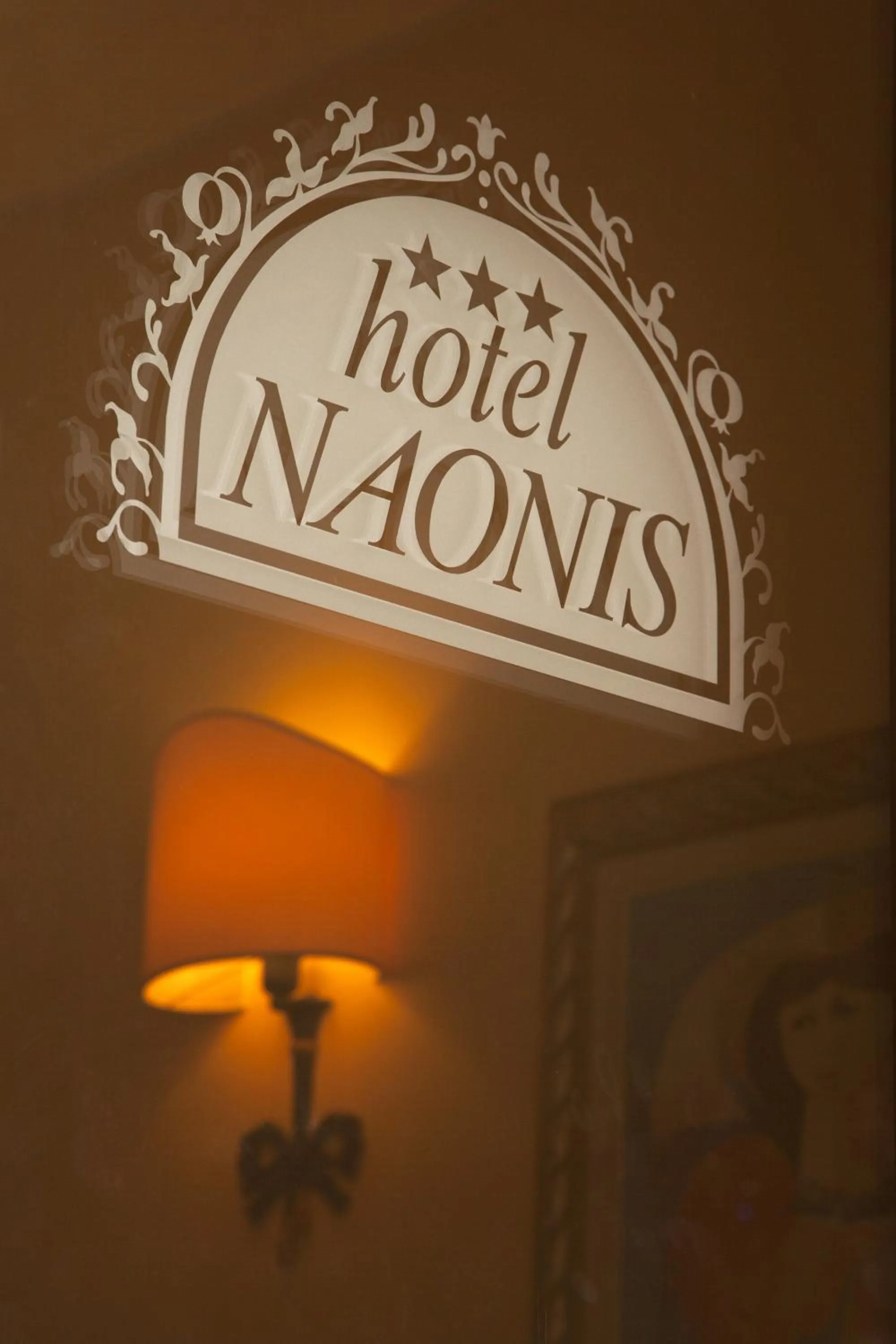 Property logo or sign in Hotel Naonis