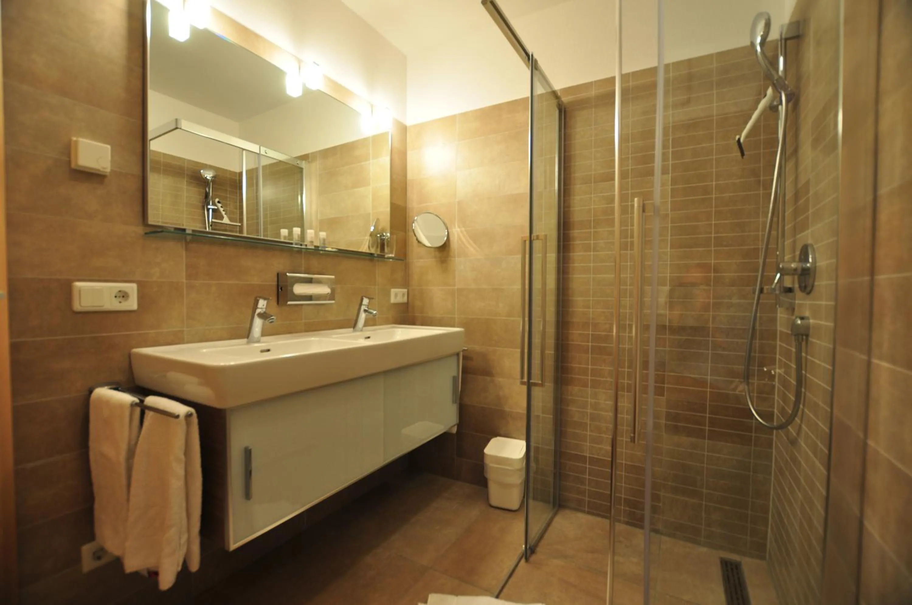 Shower in AvenidA Mountain Resort by Alpin Rentals